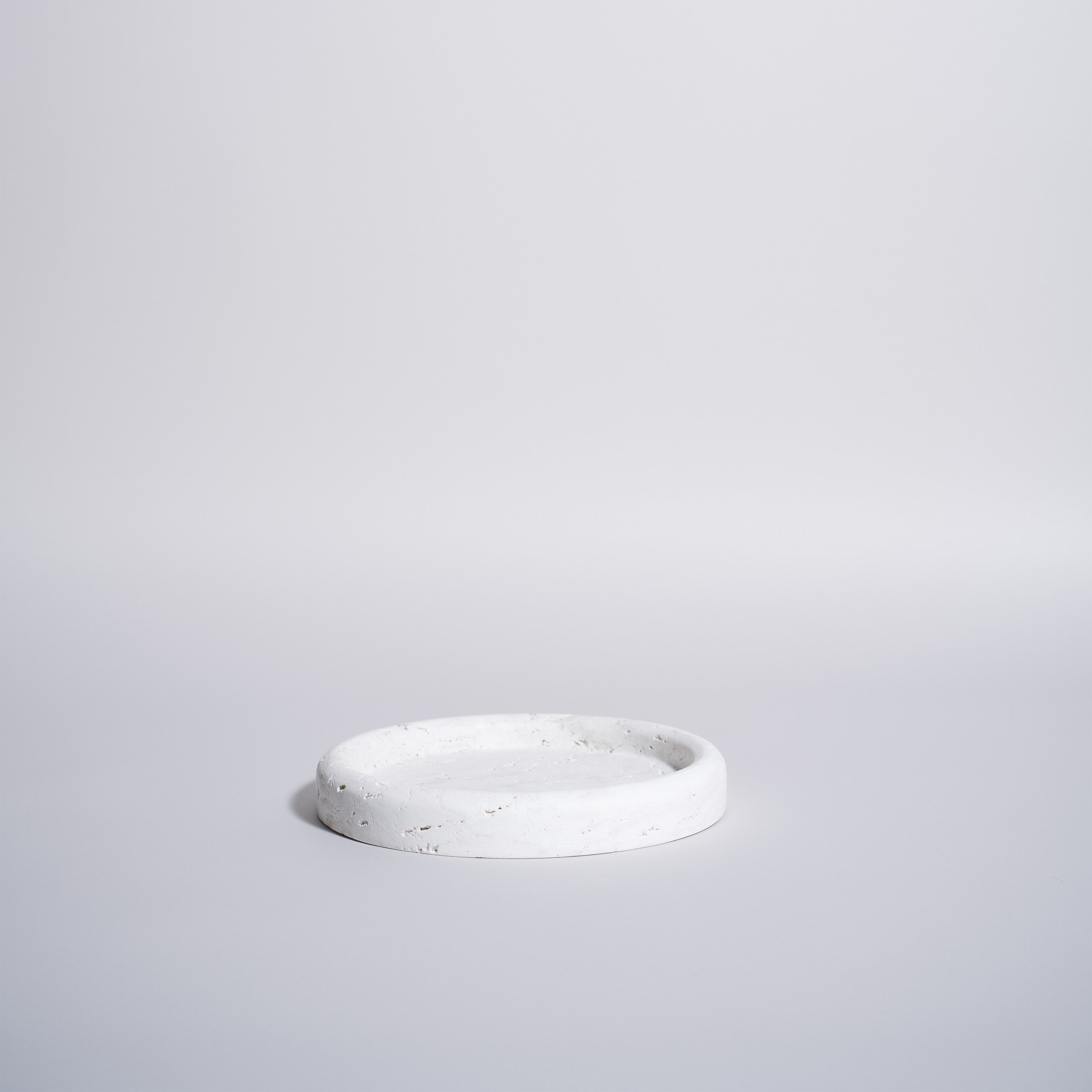 As Shown in White Travertine