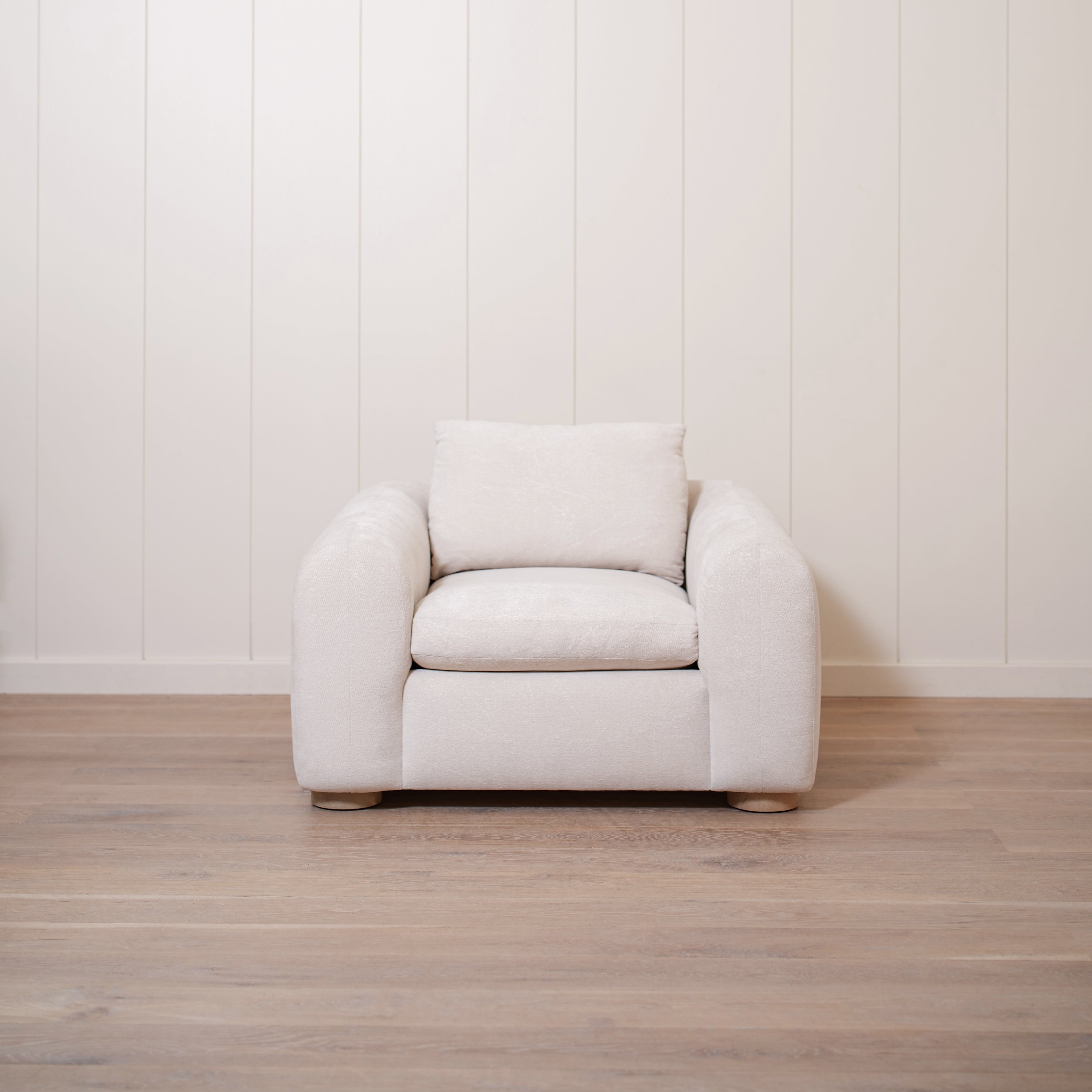 As Shown in Upholstered Barney Stone, Oak Round Legs finished in Cashmere Brown (Discontinued Finish)