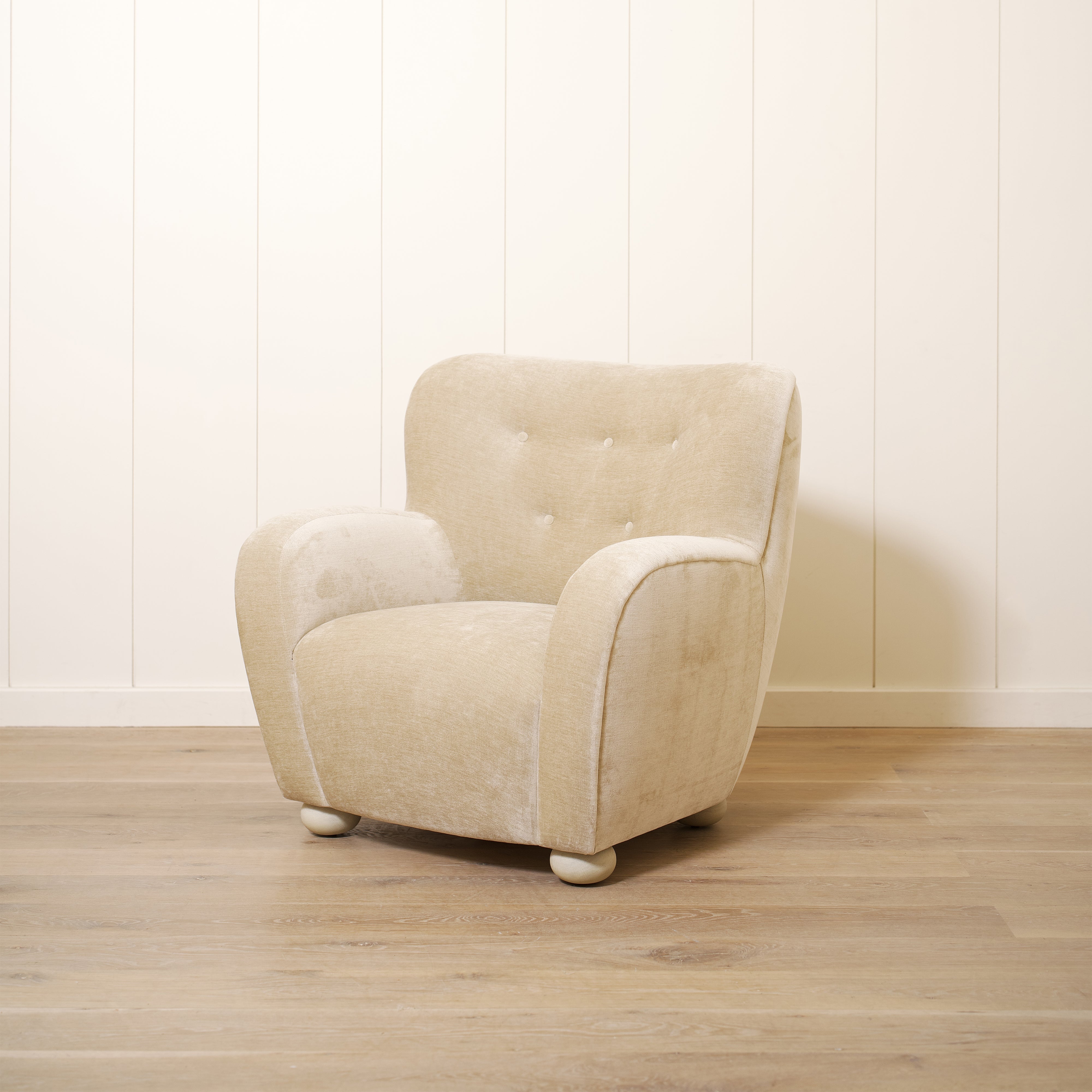 As shown upholstered in Canyon Sand, legs in Sand finish