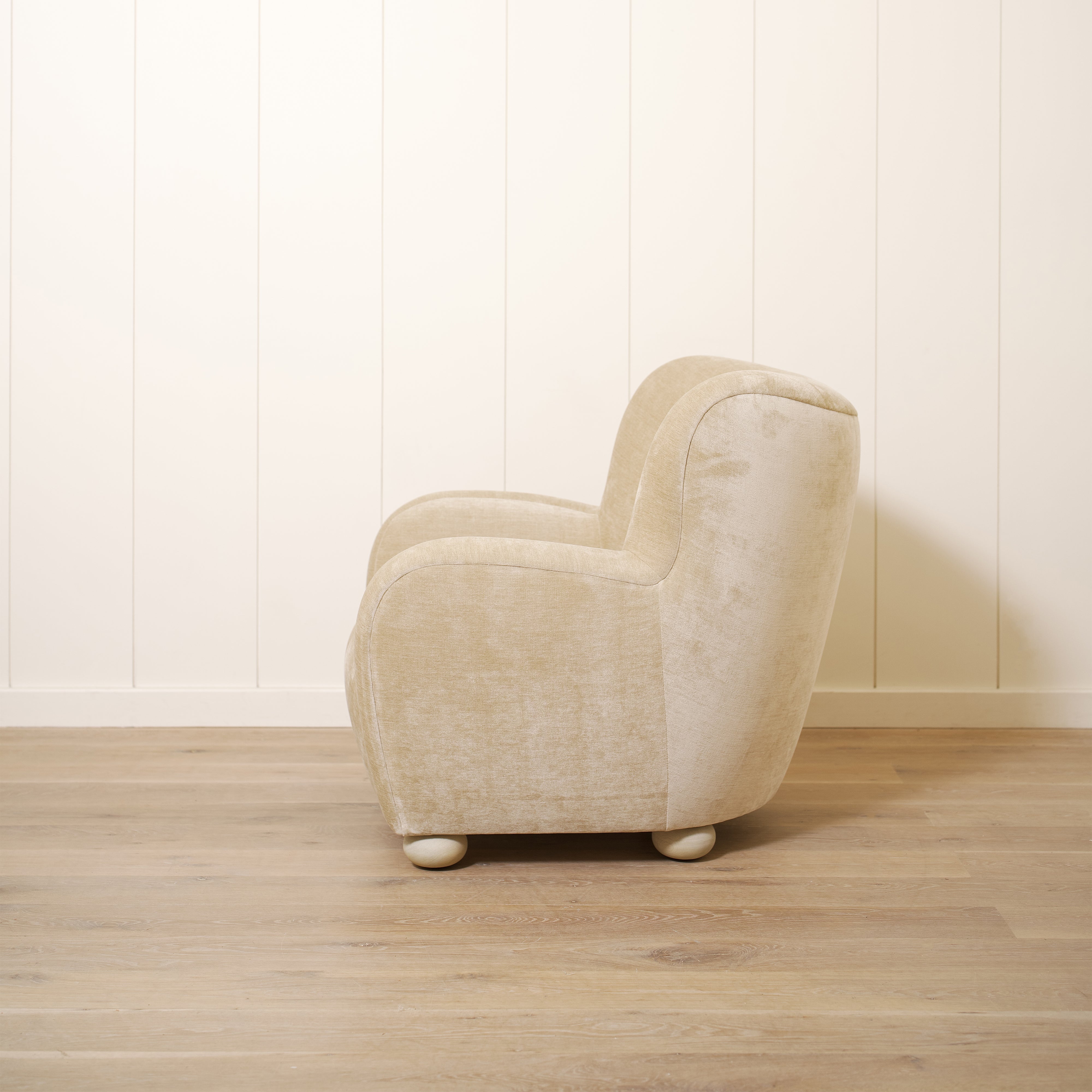 As shown upholstered in Canyon Sand, legs in Sand finish