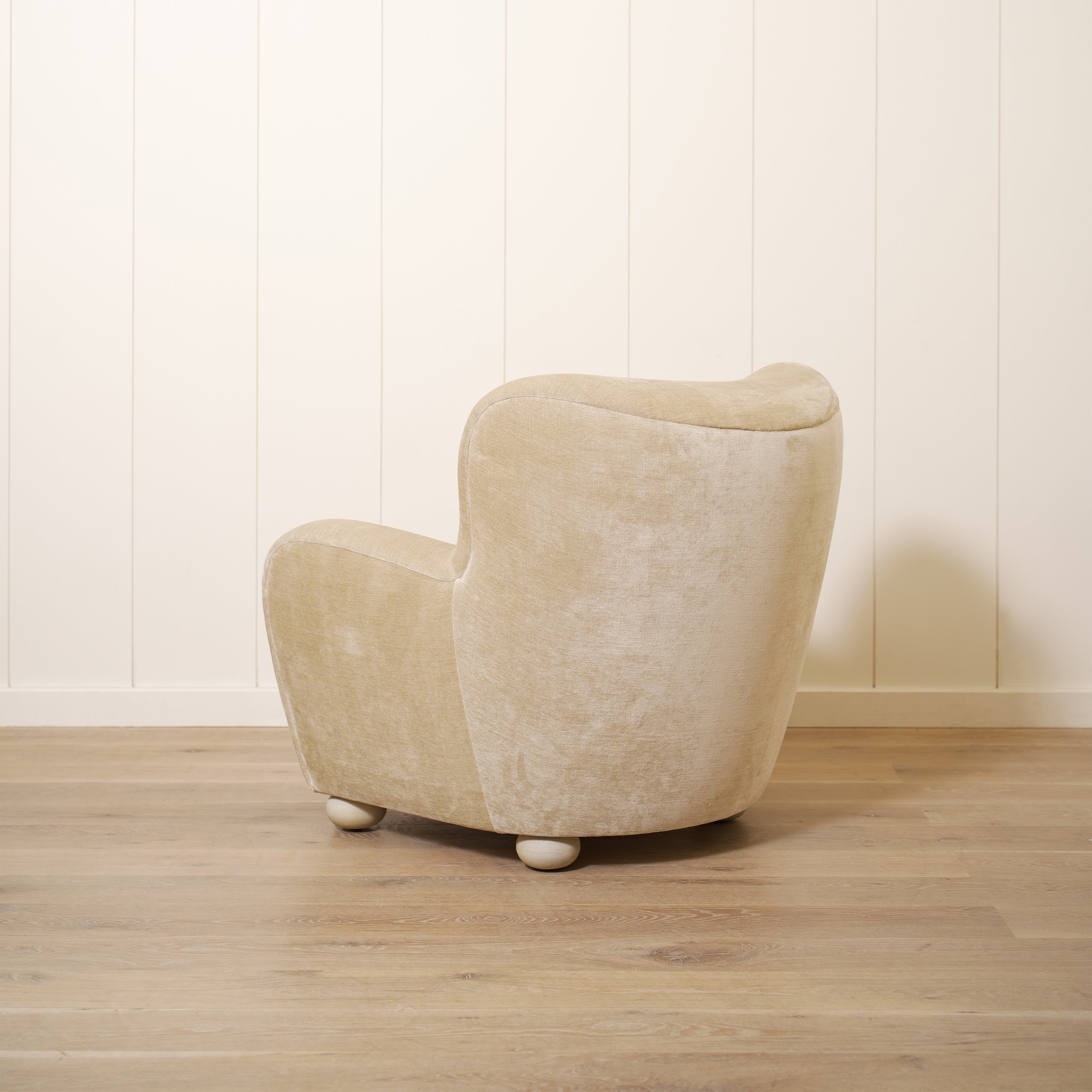 As shown upholstered in Canyon Sand, legs in Sand finish