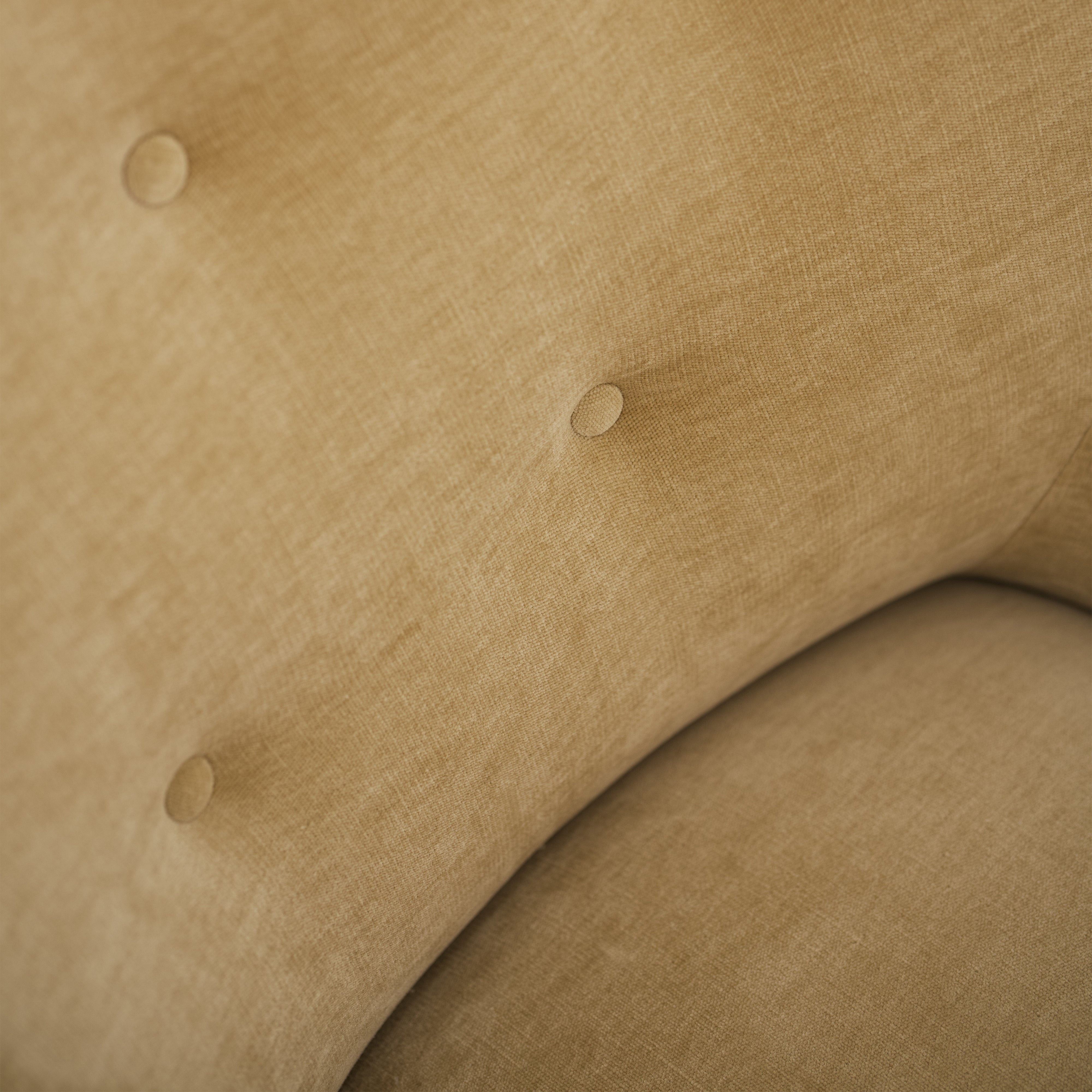 As shown upholstered in Canyon Sand, legs in Sand finish