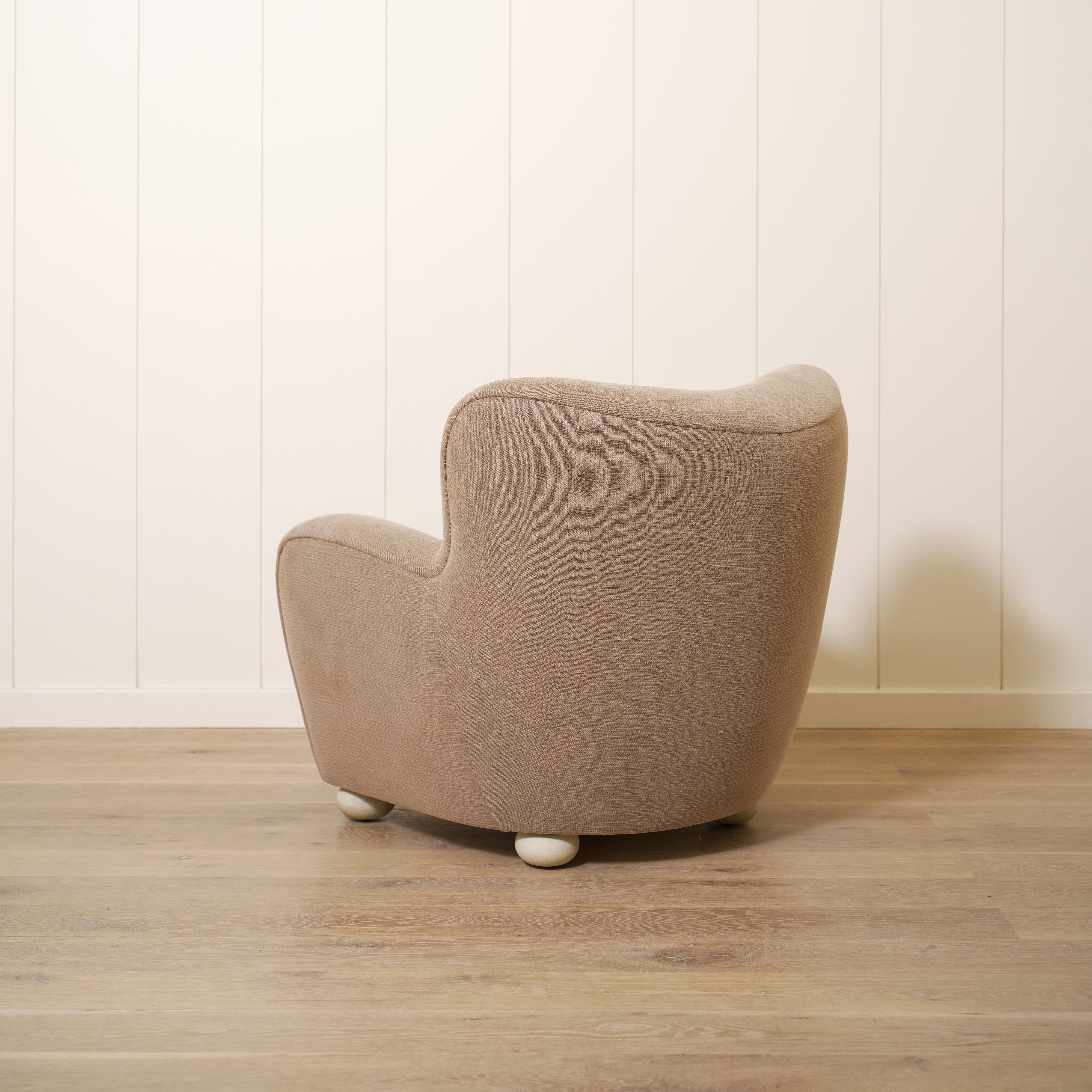 As shown upholstered in Vail Bark, legs in Sand finish