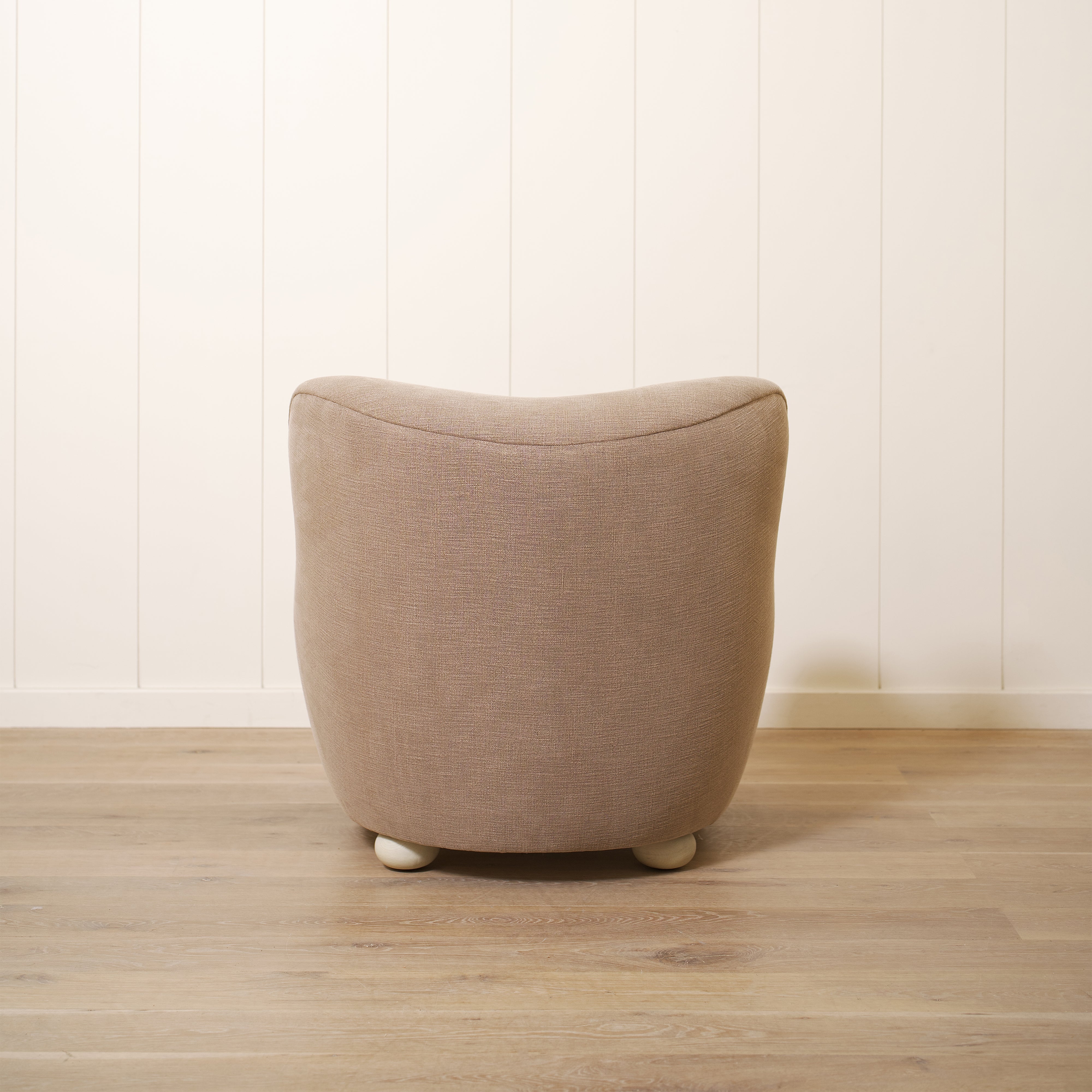 As shown upholstered in Vail Bark, legs in Sand finish