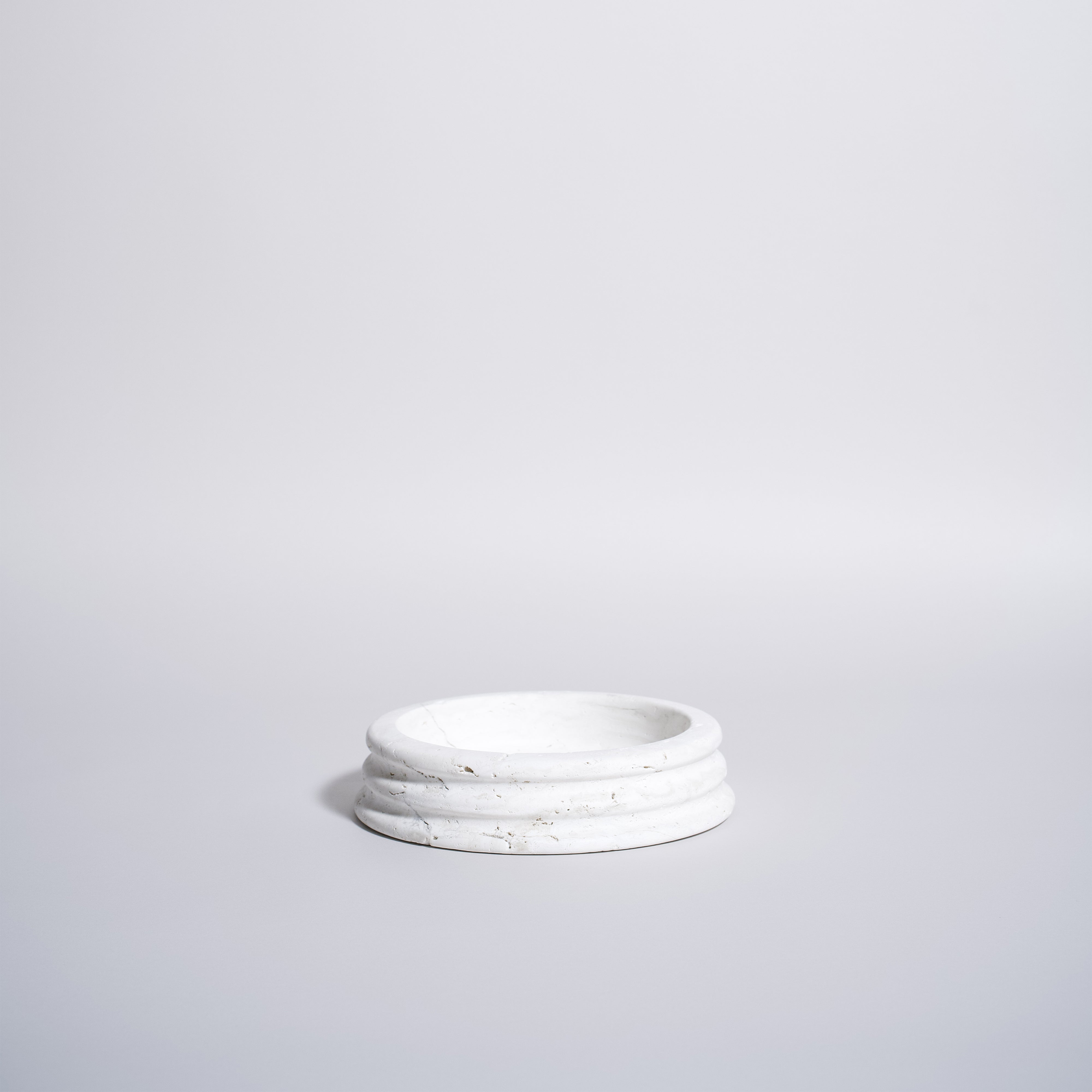 As Shown in White Travertine