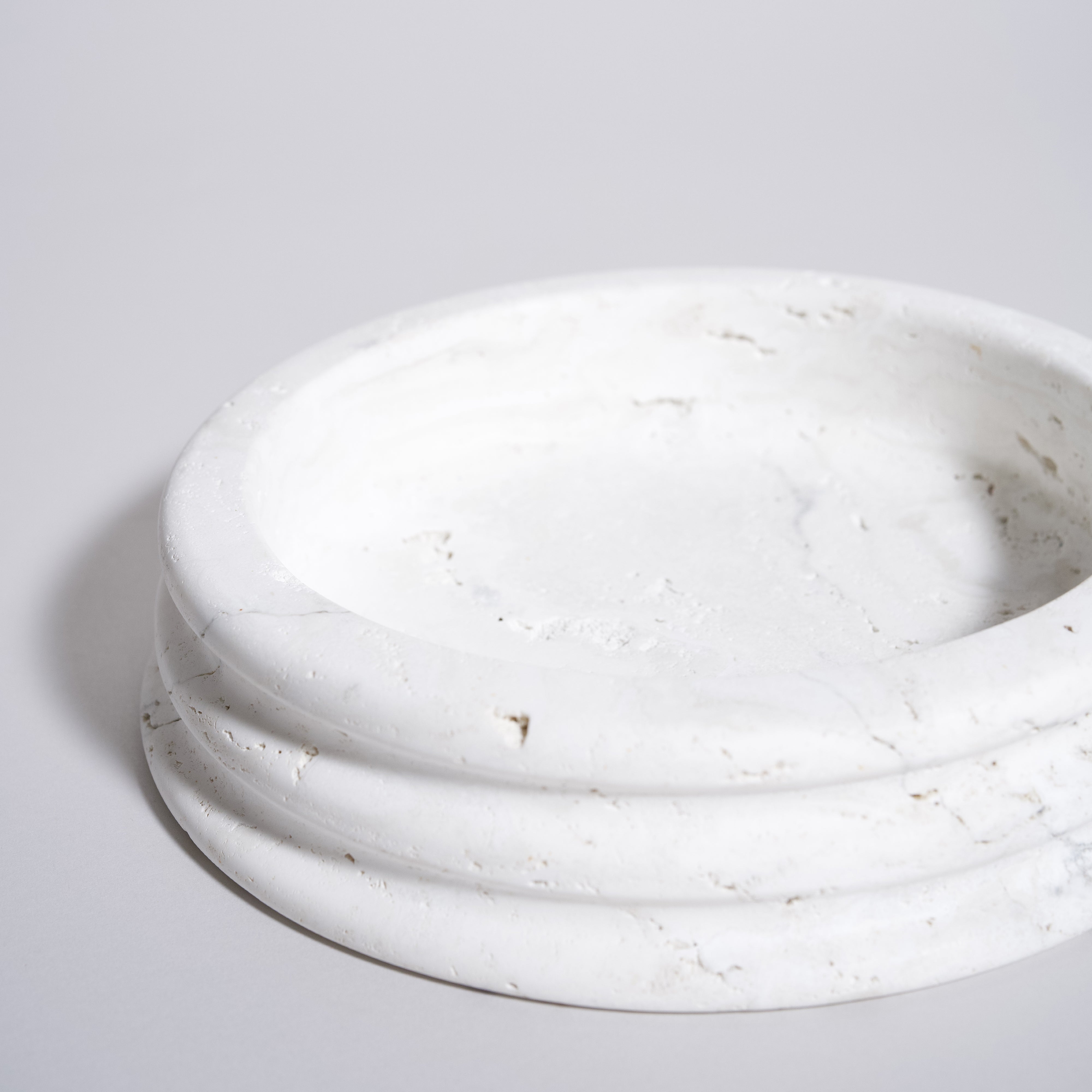 As Shown in White Travertine