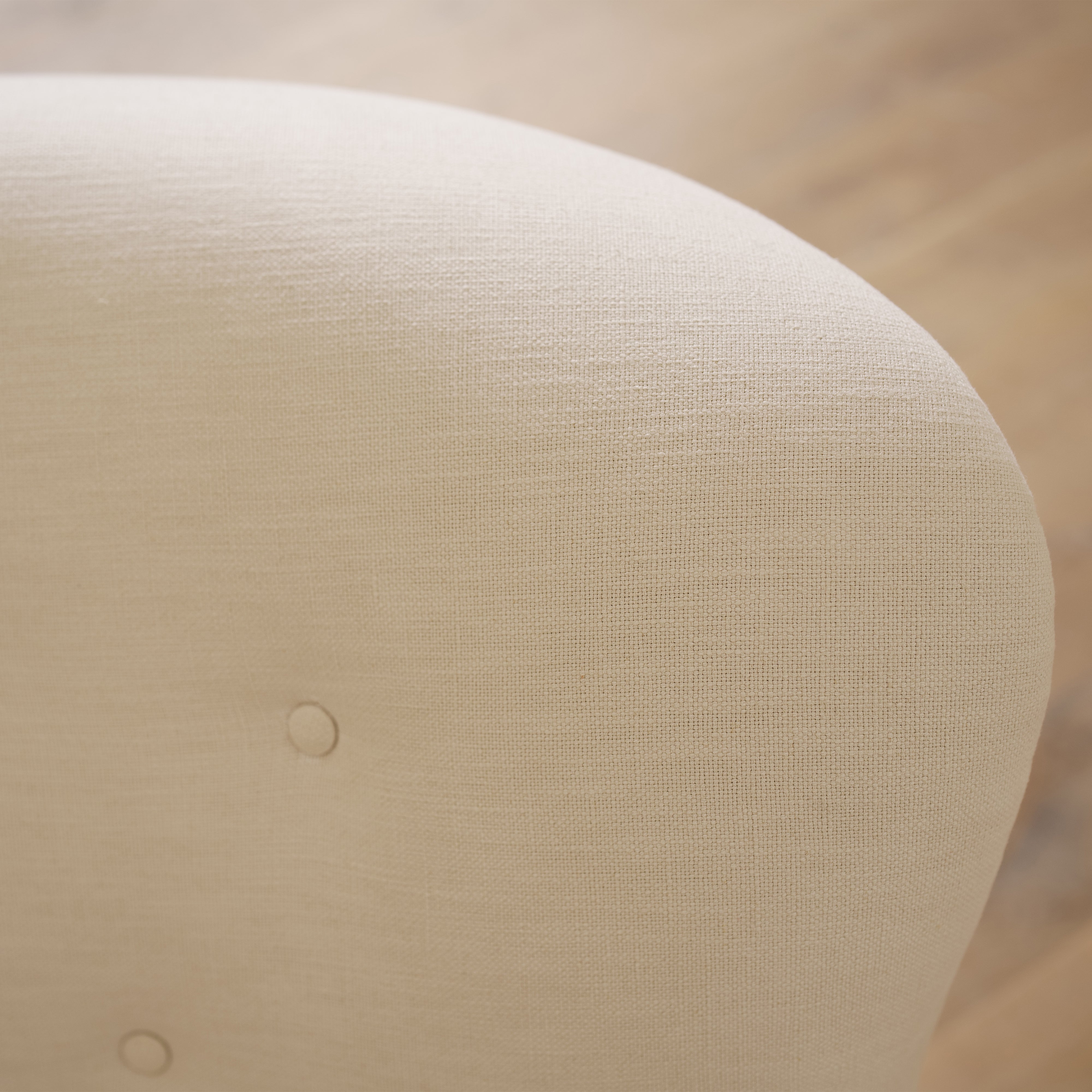 As shown upholstered in Vail Oyster, legs in Sand finish