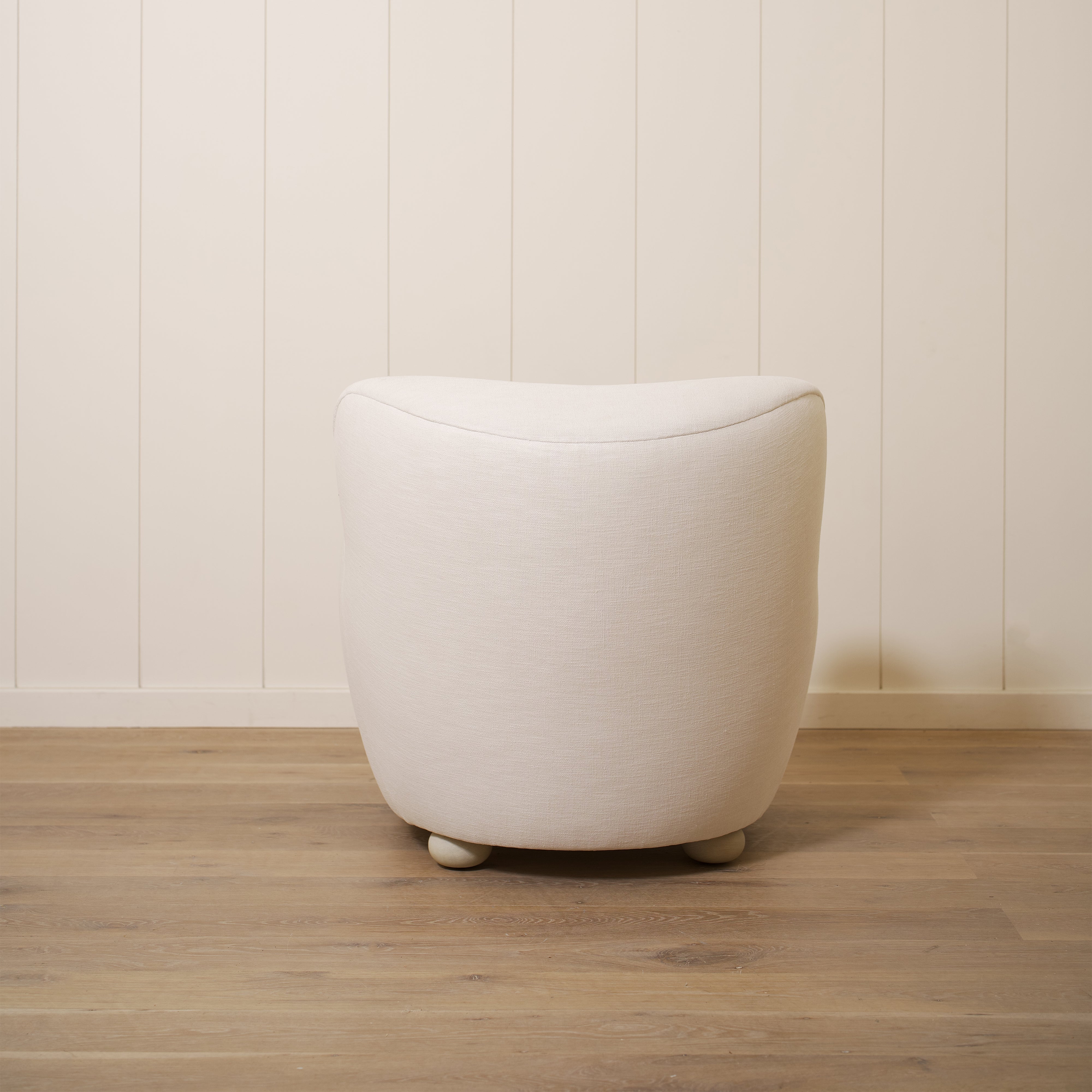 As shown upholstered in Vail Oyster, legs in Sand finish