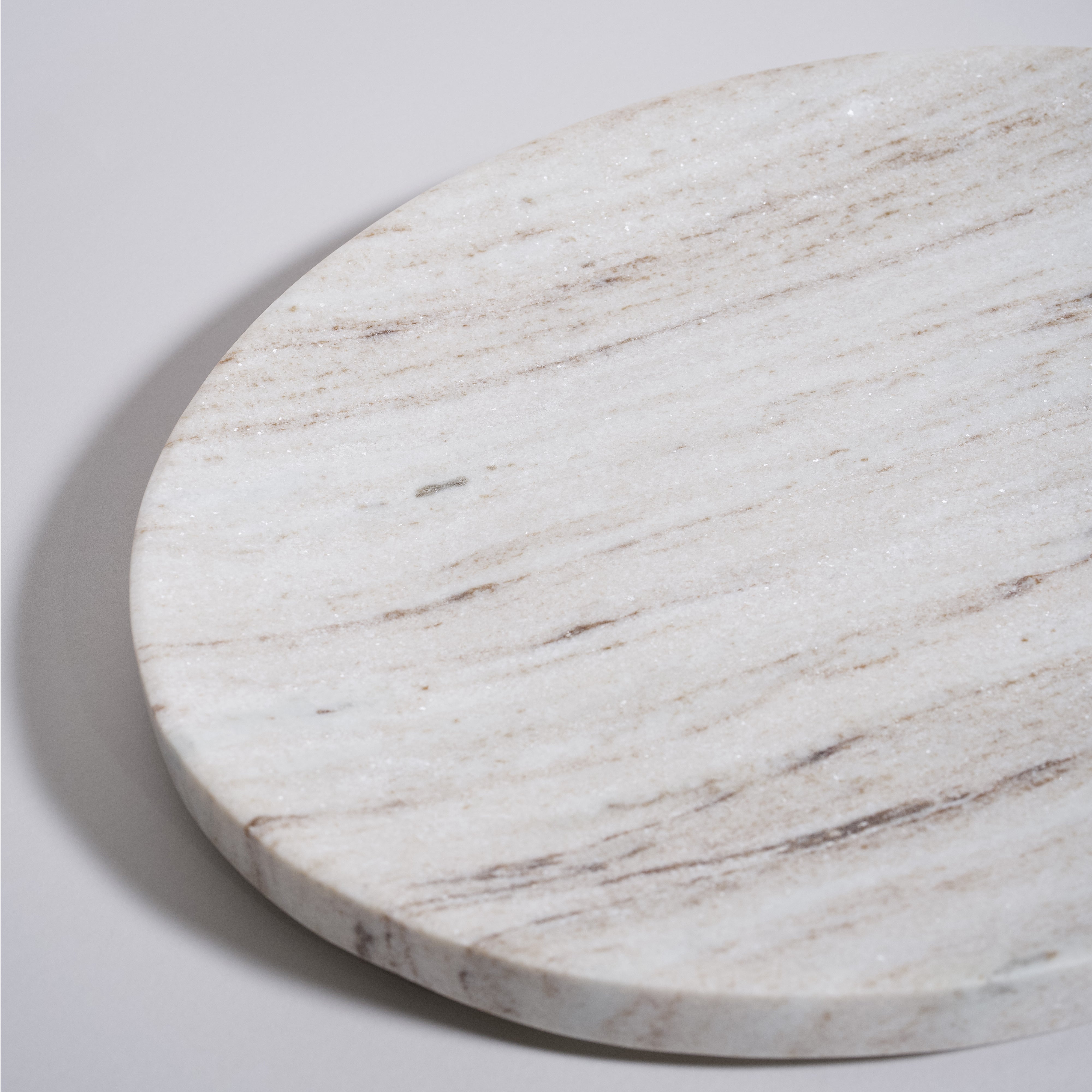 As shown in White Wooden Marble