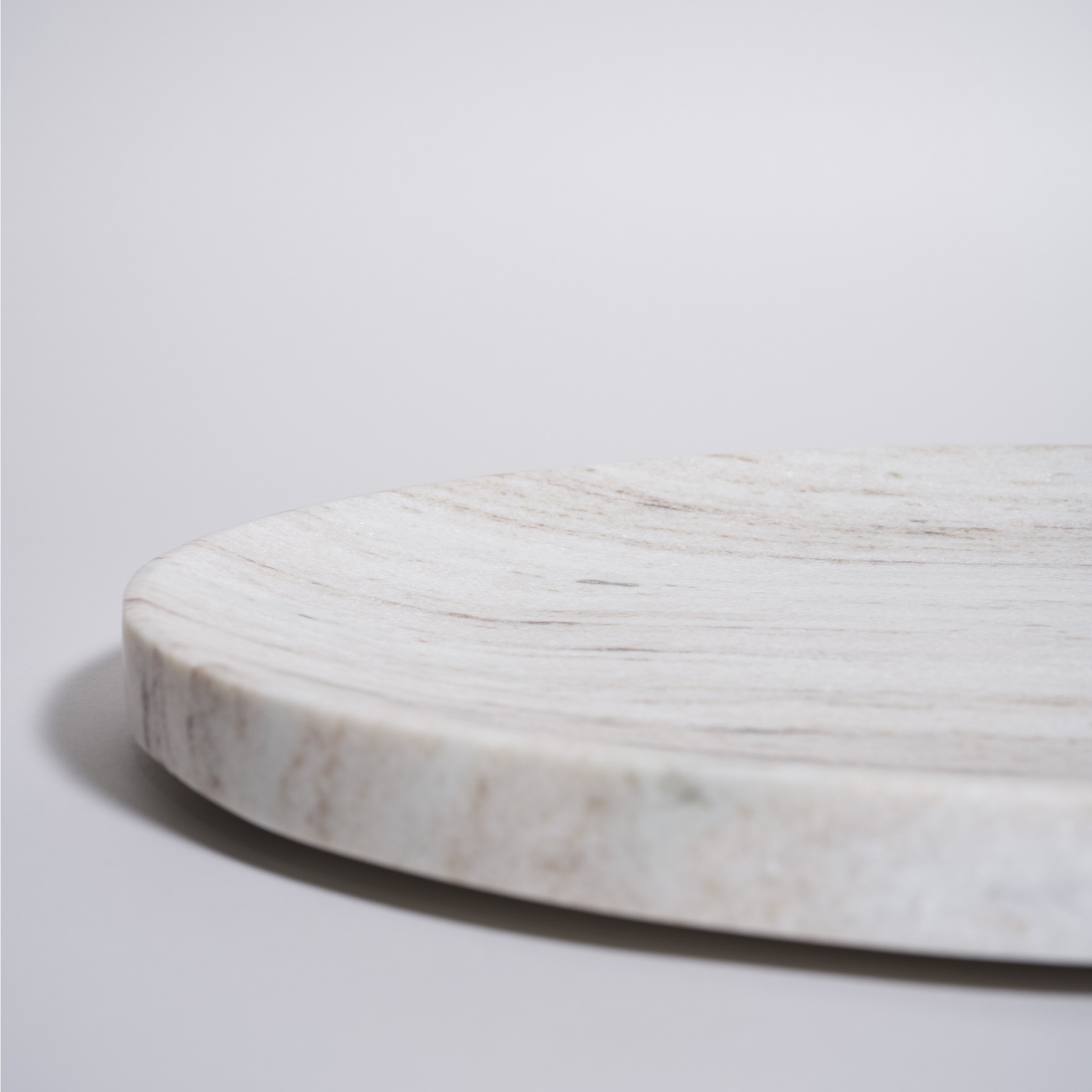 As shown in White Wooden Marble