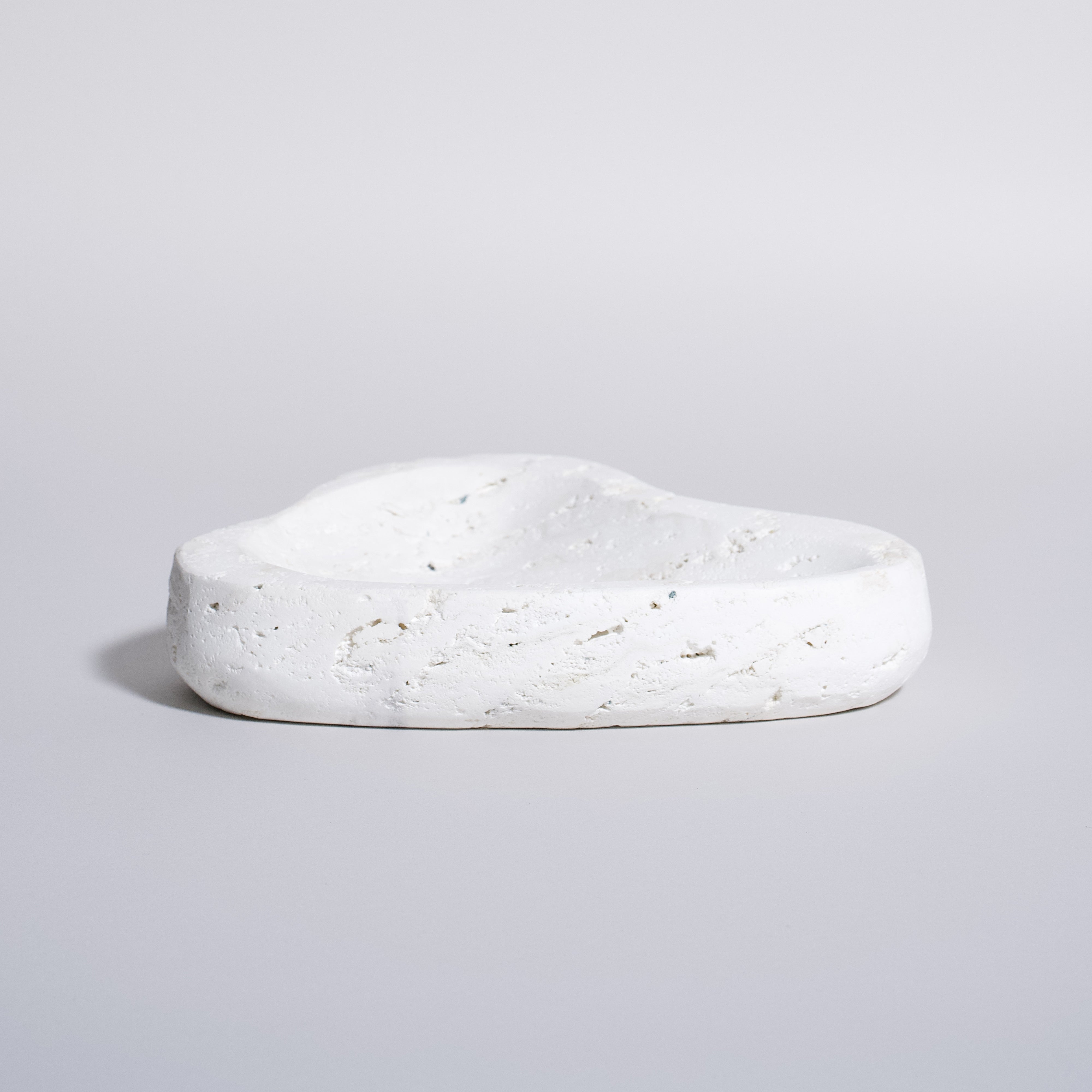 As Shown in White Travertine