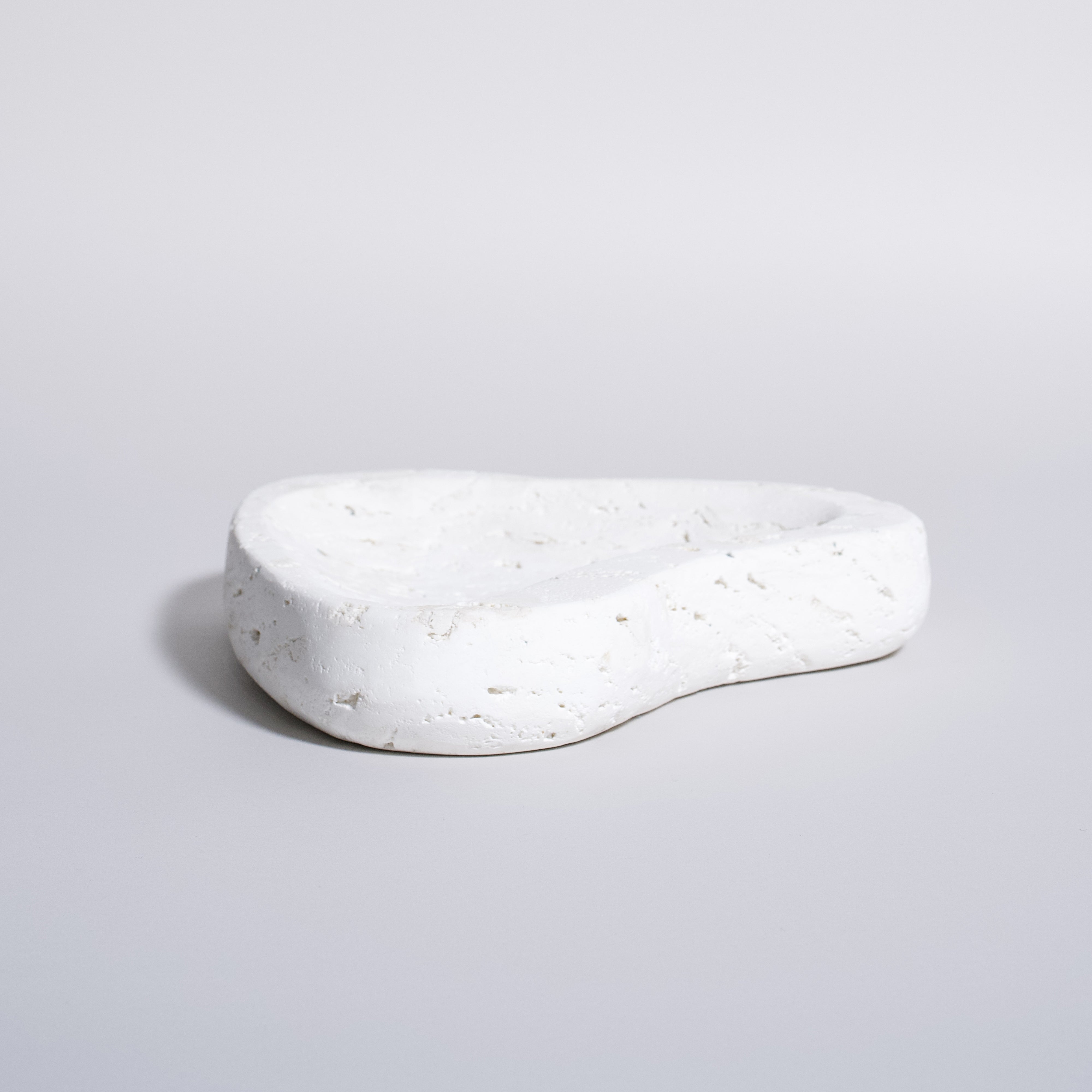 As Shown in White Travertine