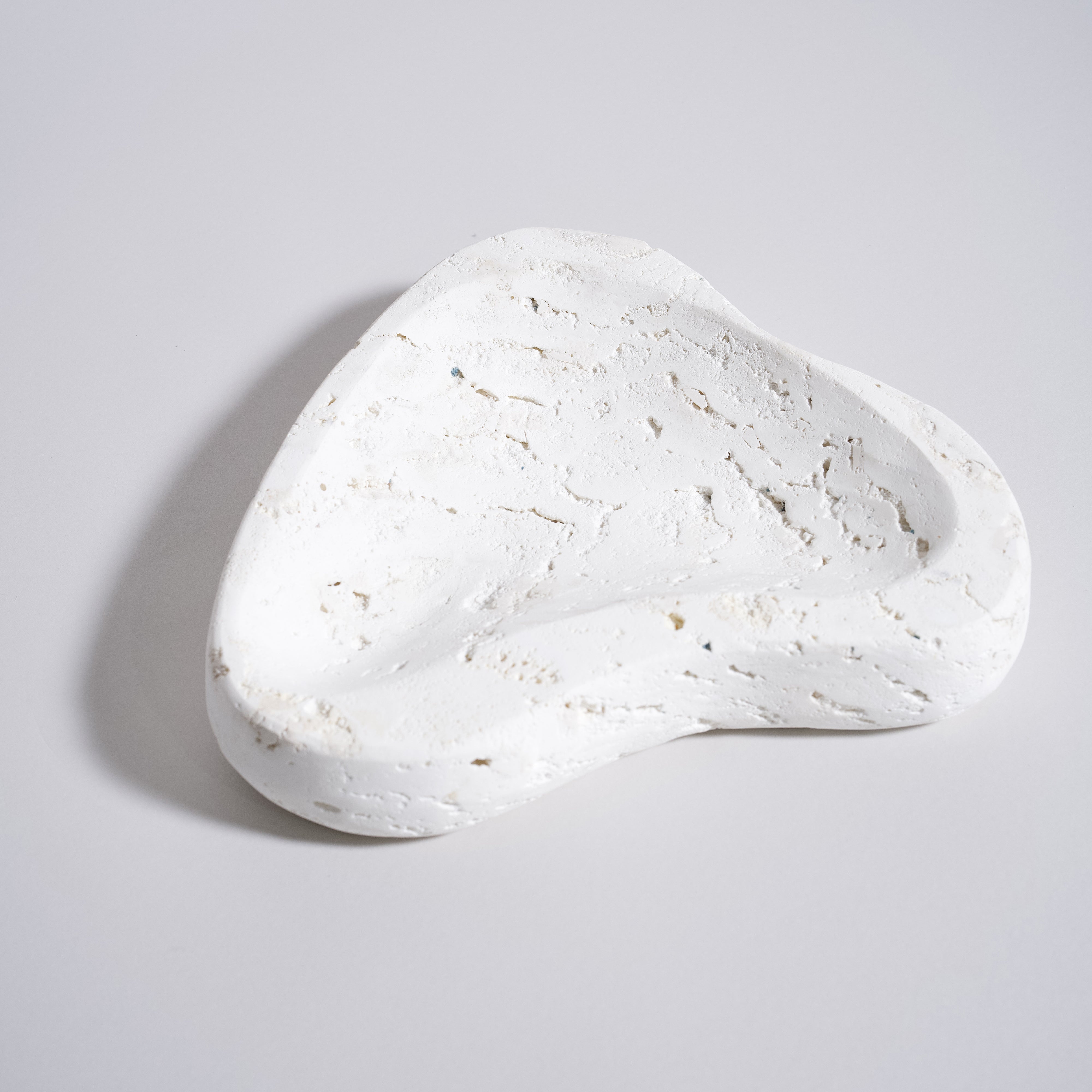 As Shown in White Travertine