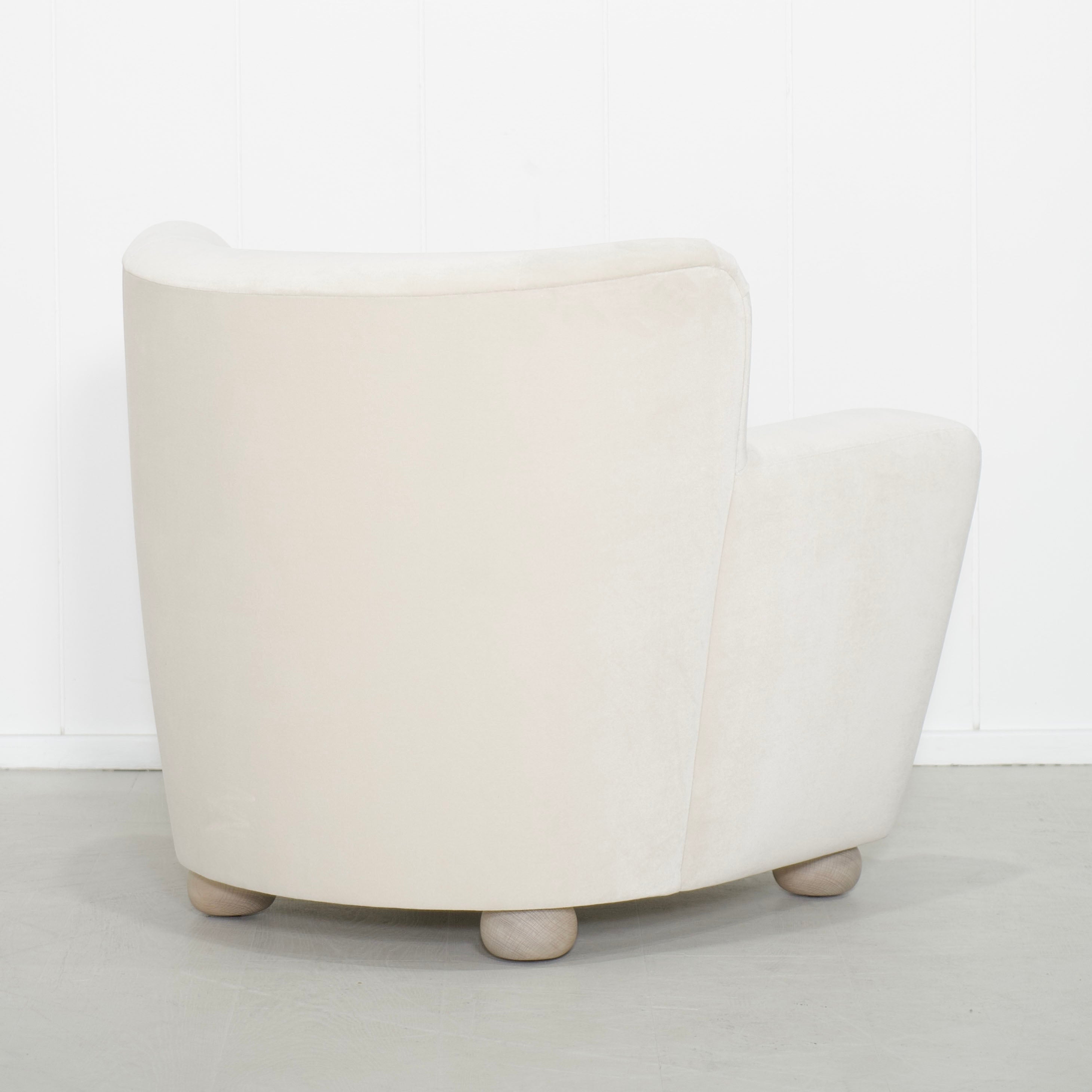 As Shown: in Sky Natural, oak legs finished in Mint White Natural.