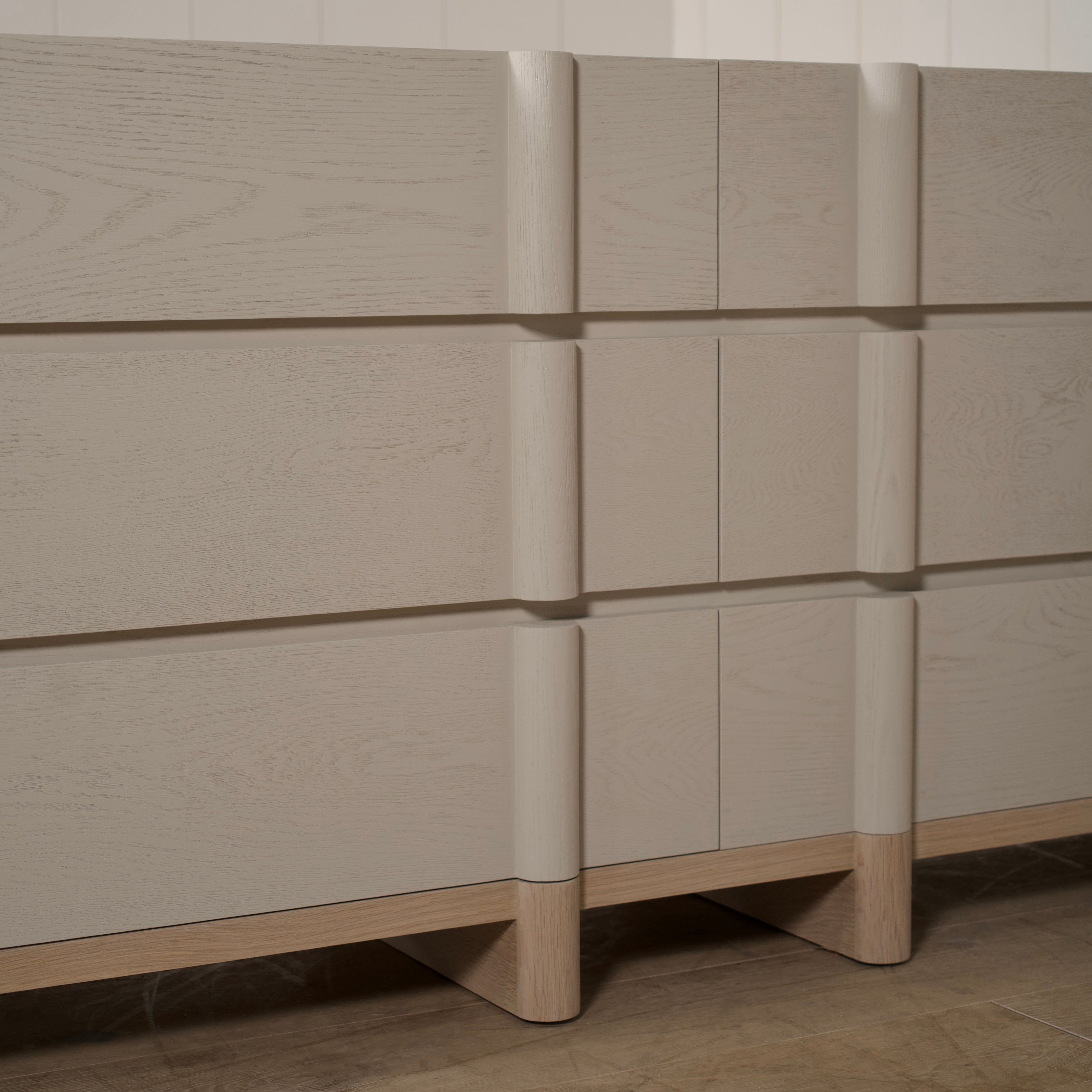 As Shown: Variant 1: (Body) Ash wire brushed in Revere Pewter, (Base) Oak stained in Sand