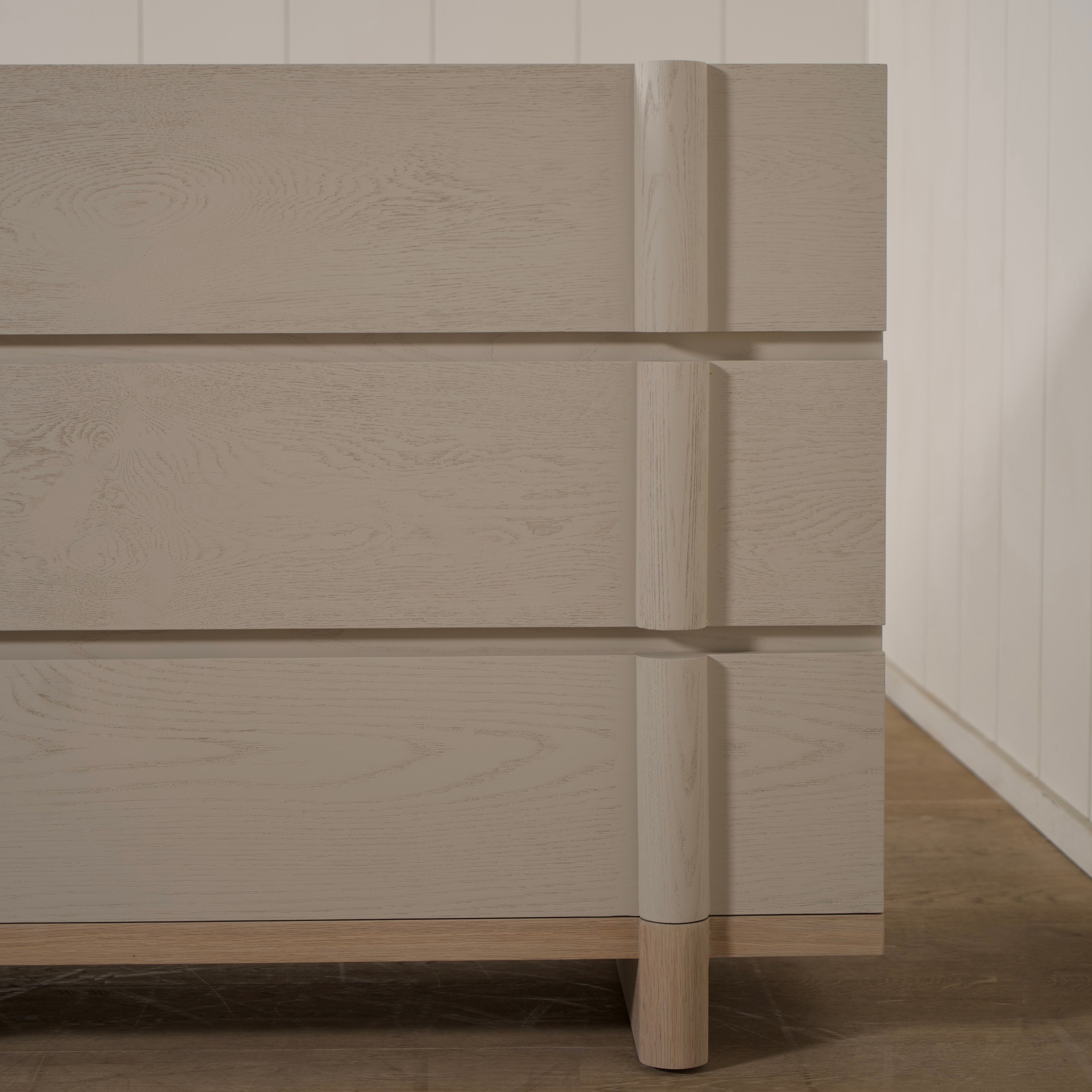 As Shown: Variant 1: (Body) Ash wire brushed in Revere Pewter, (Base) Oak stained in Sand