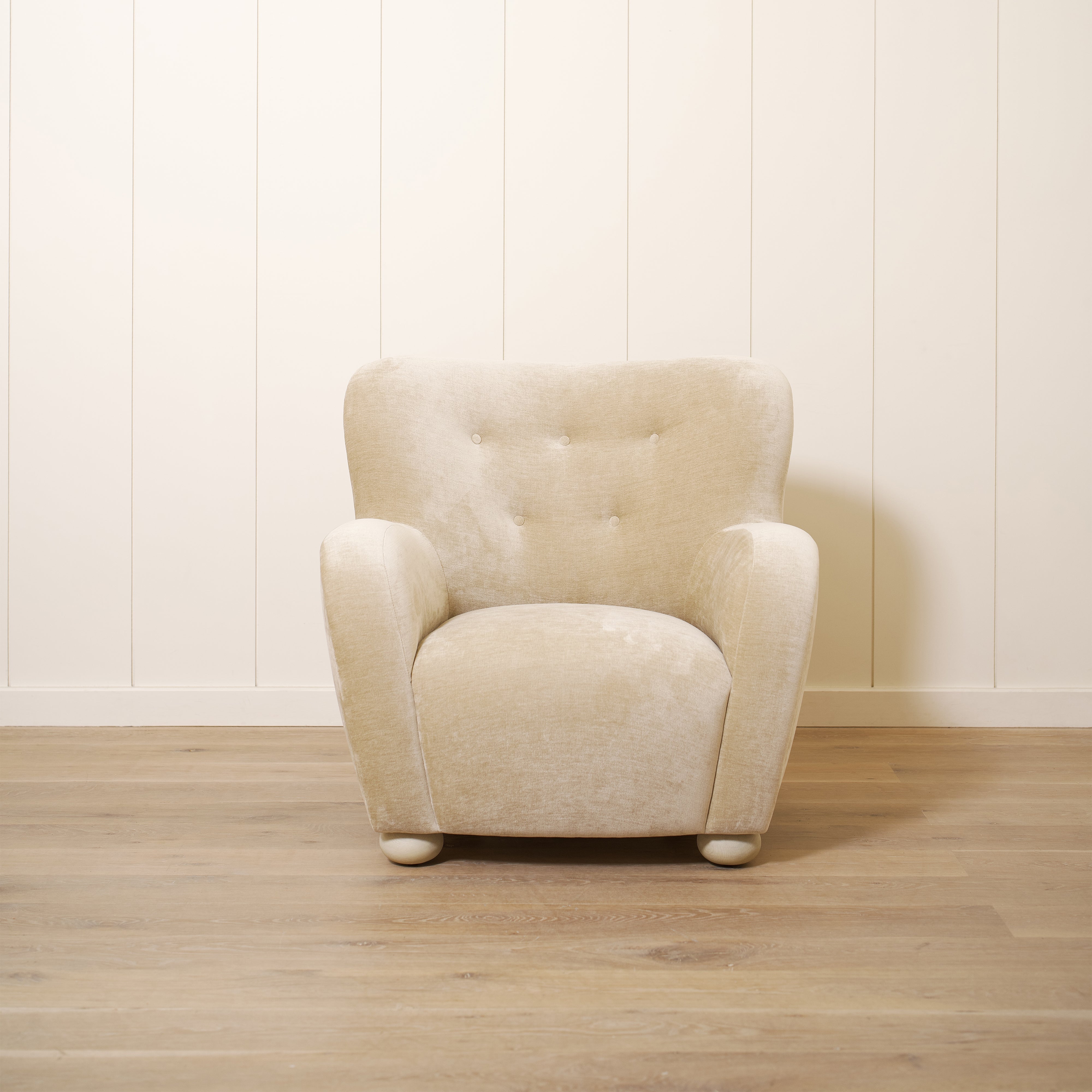 As shown upholstered in Canyon Sand, legs in Sand finish