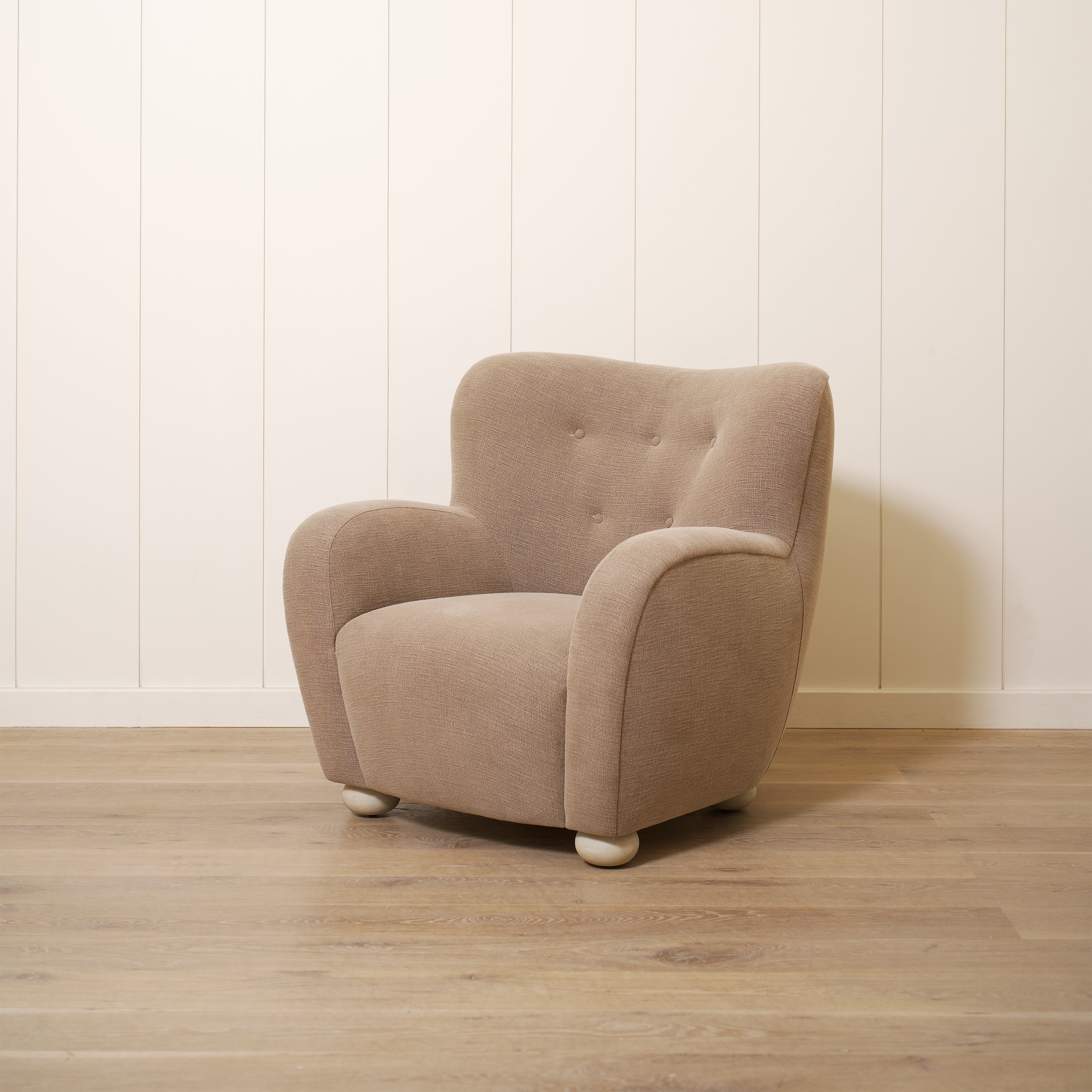 As shown upholstered in Vail Bark, legs in Sand finish