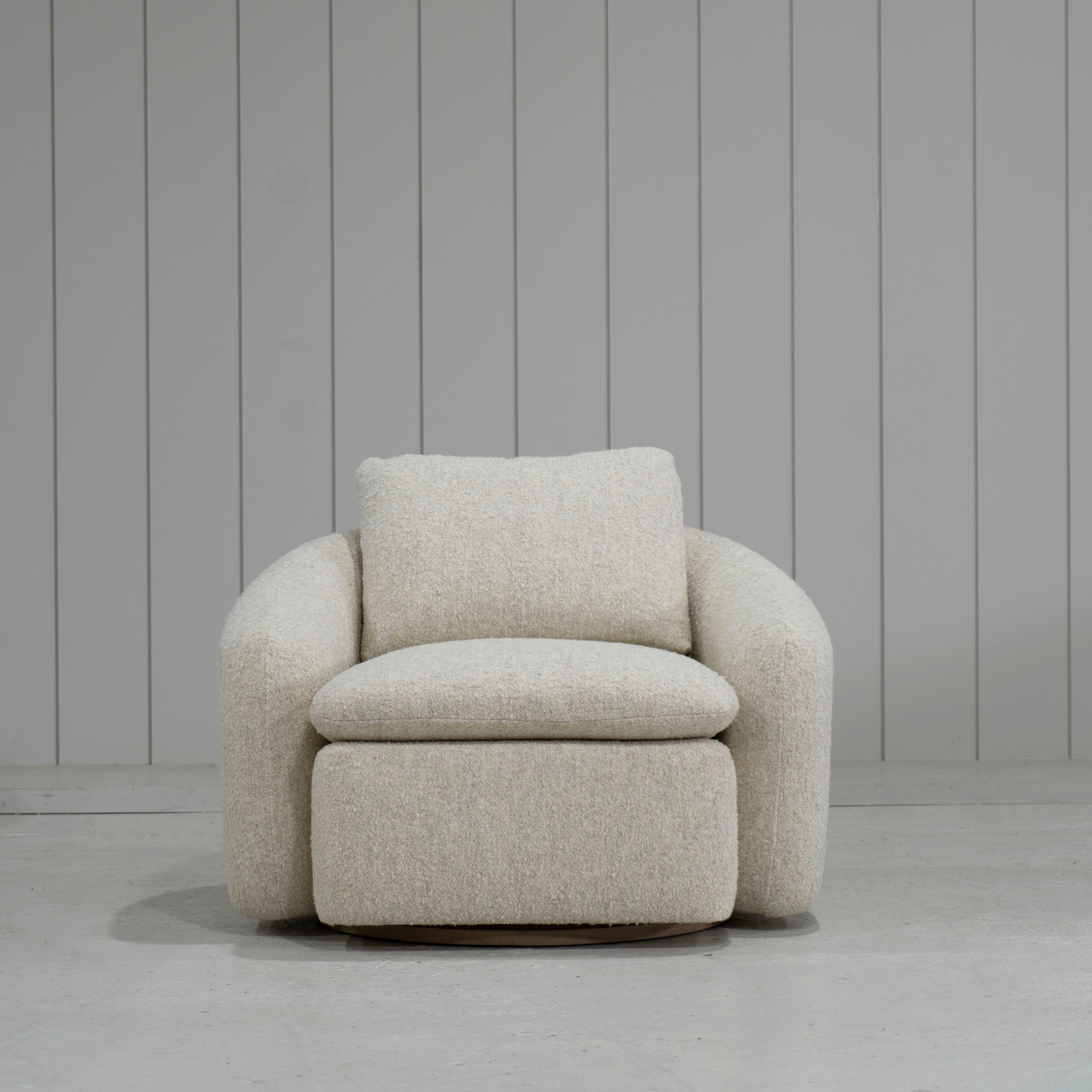 As Shown: in Berber Natural, swivel finished in Mint White Natural.