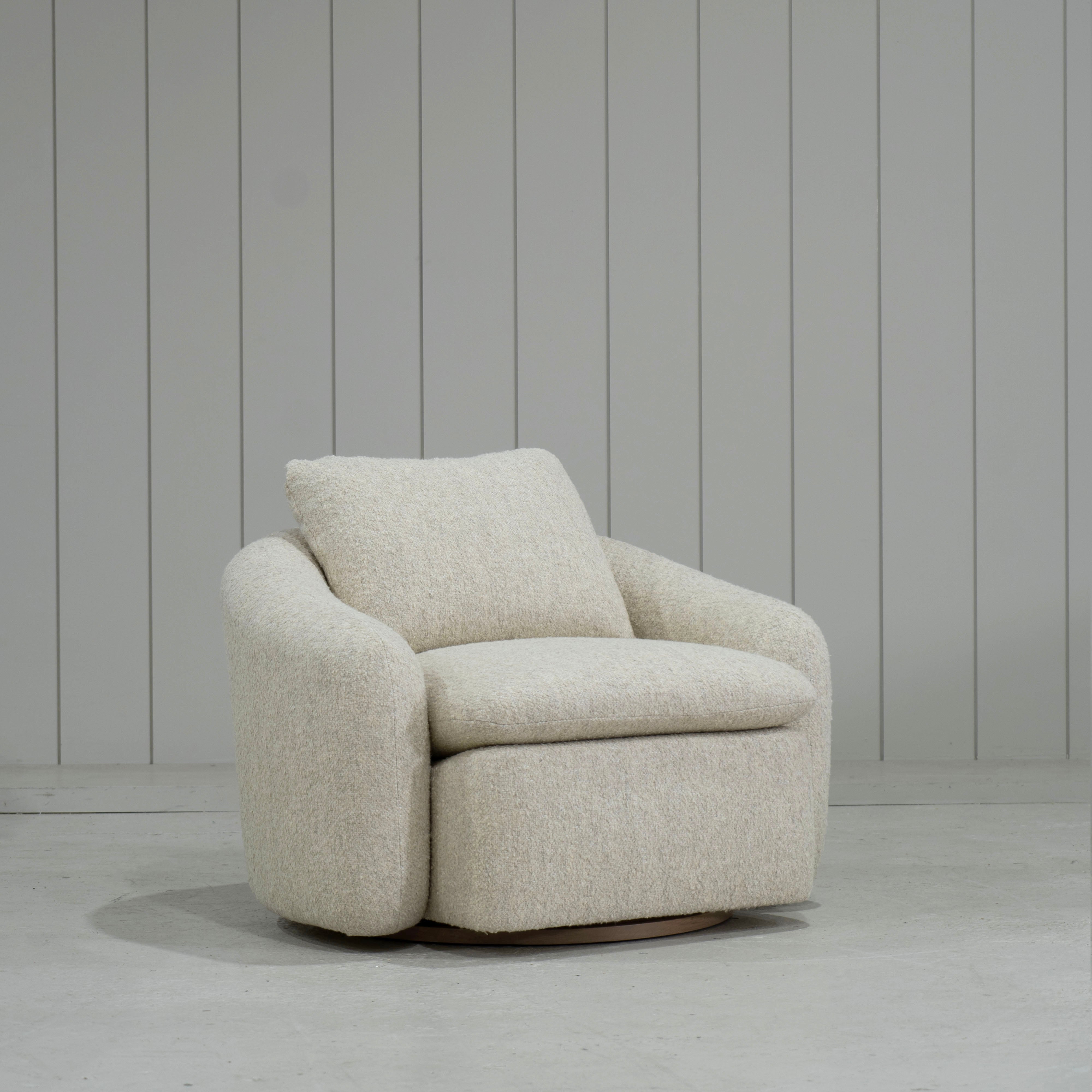 As Shown: in Berber Natural, swivel finished in Mint White Natural.