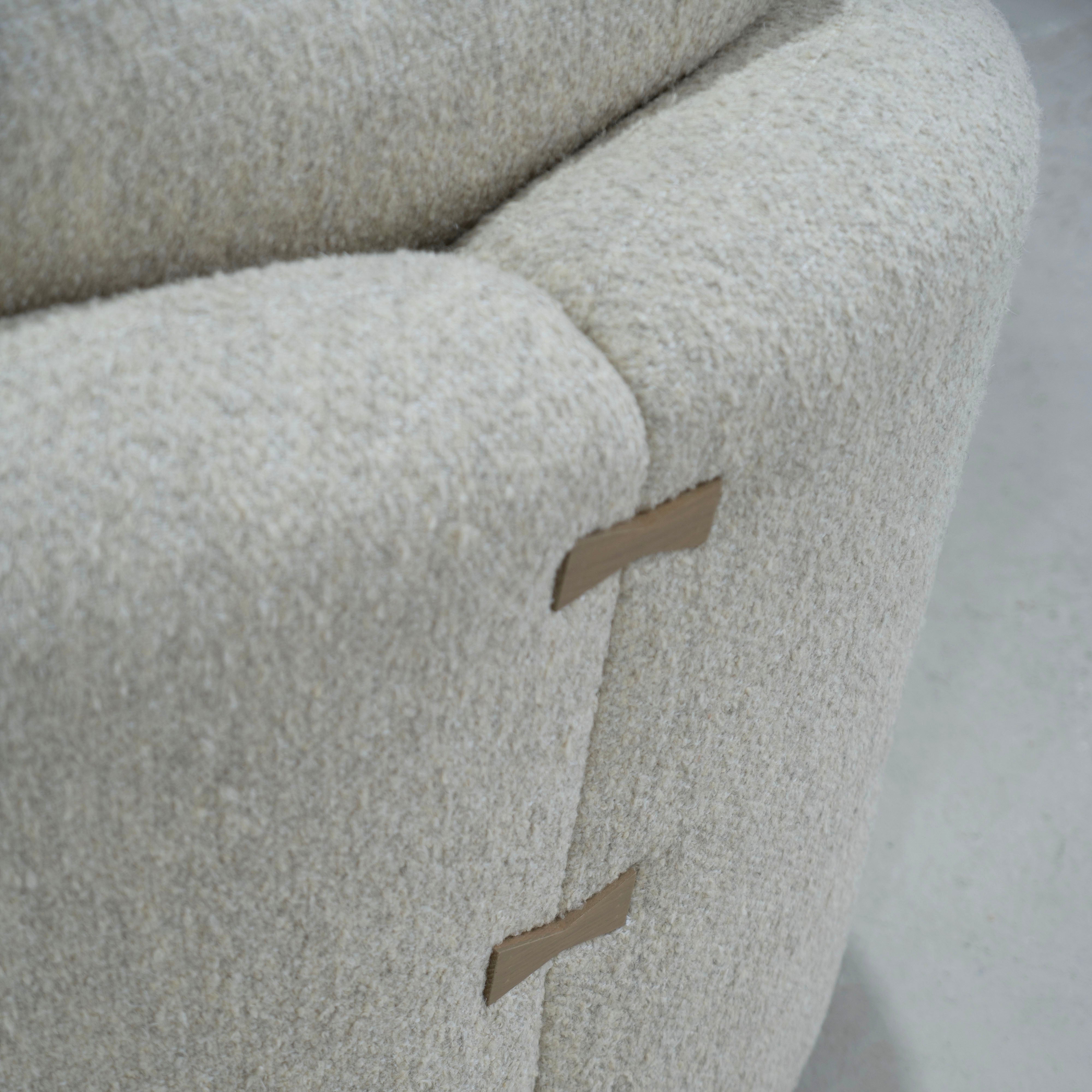 As Shown: in Berber Natural, swivel finished in Mint White Natural.