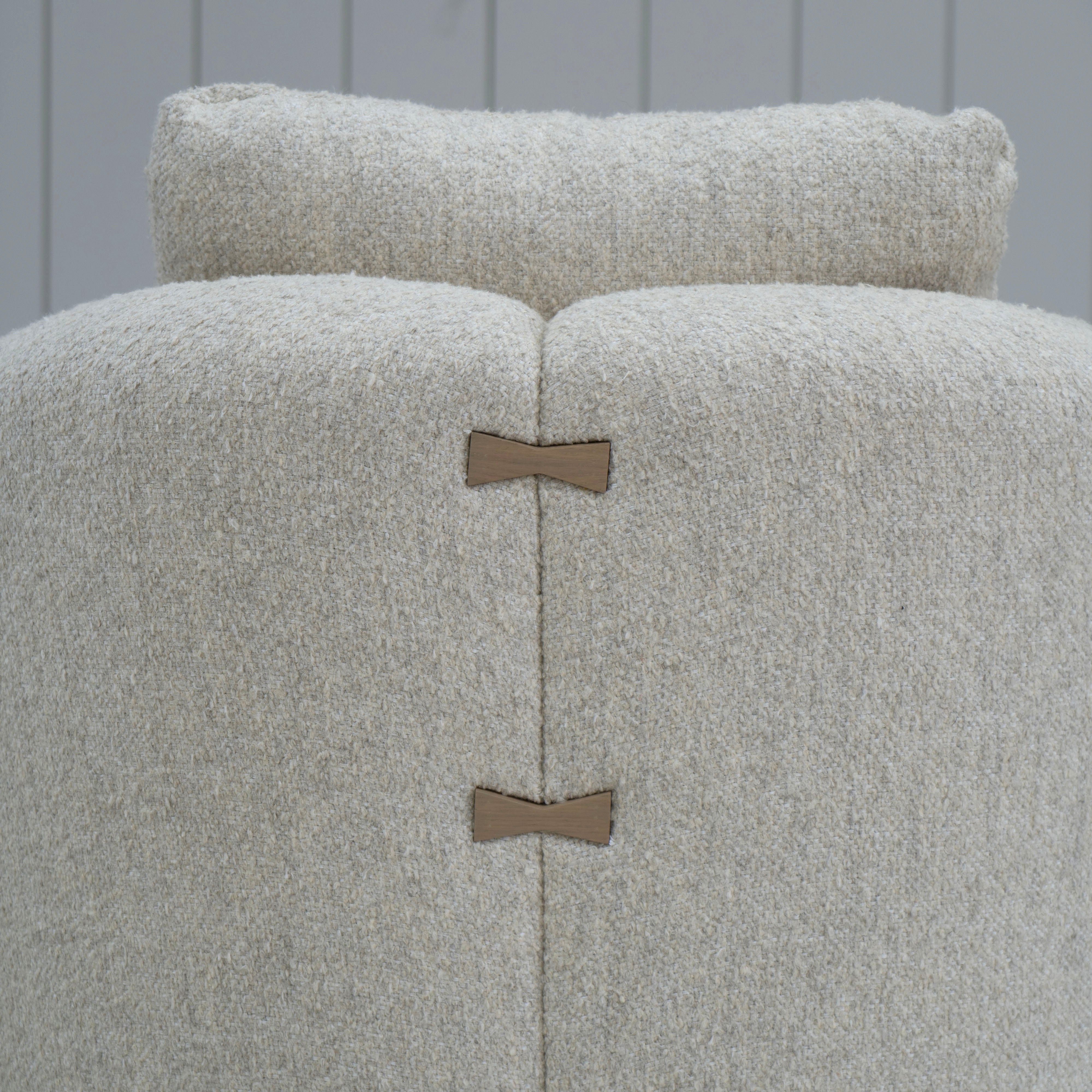 As Shown: in Berber Natural, swivel finished in Mint White Natural.
