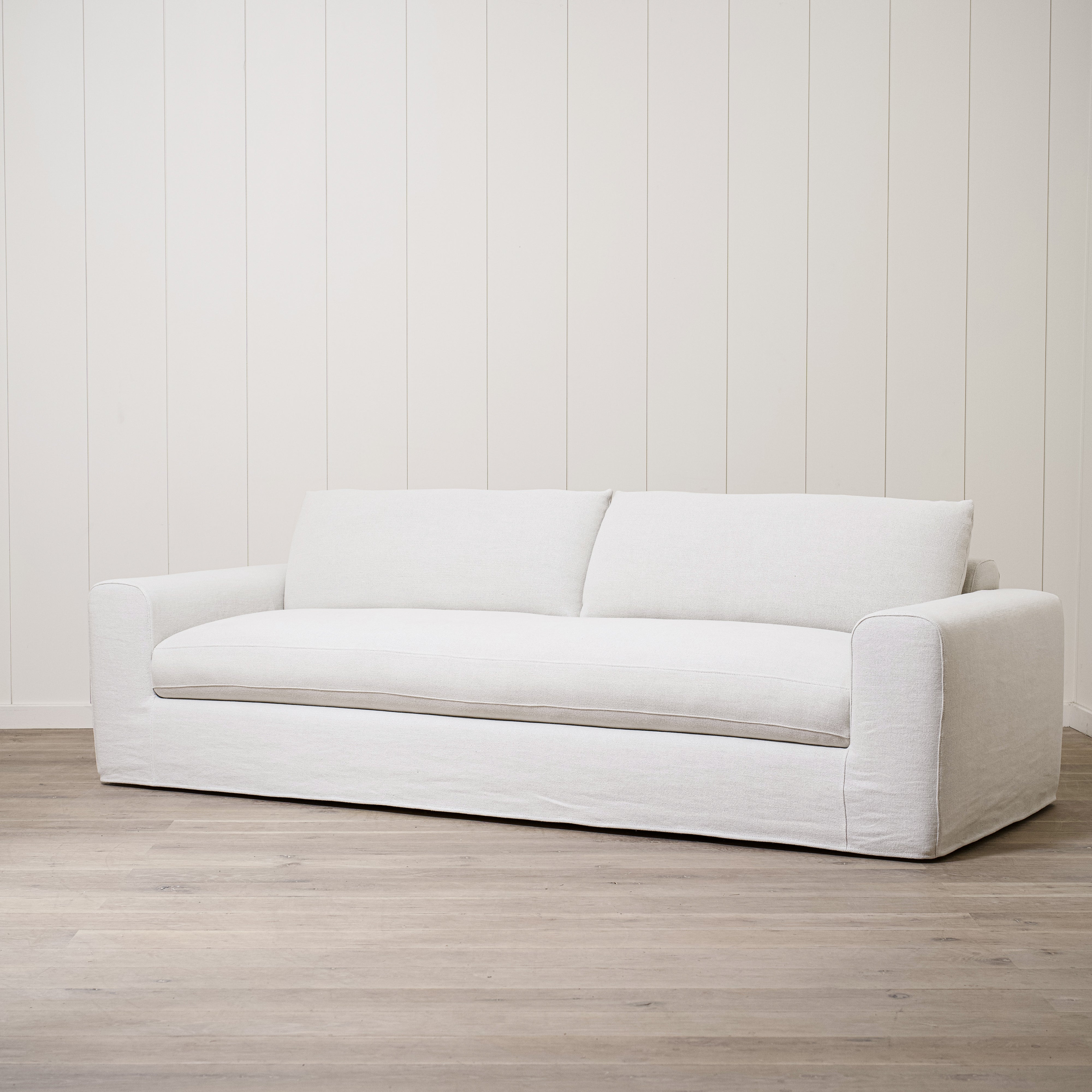 As Shown in Large, Slipcovered in Frame Natural