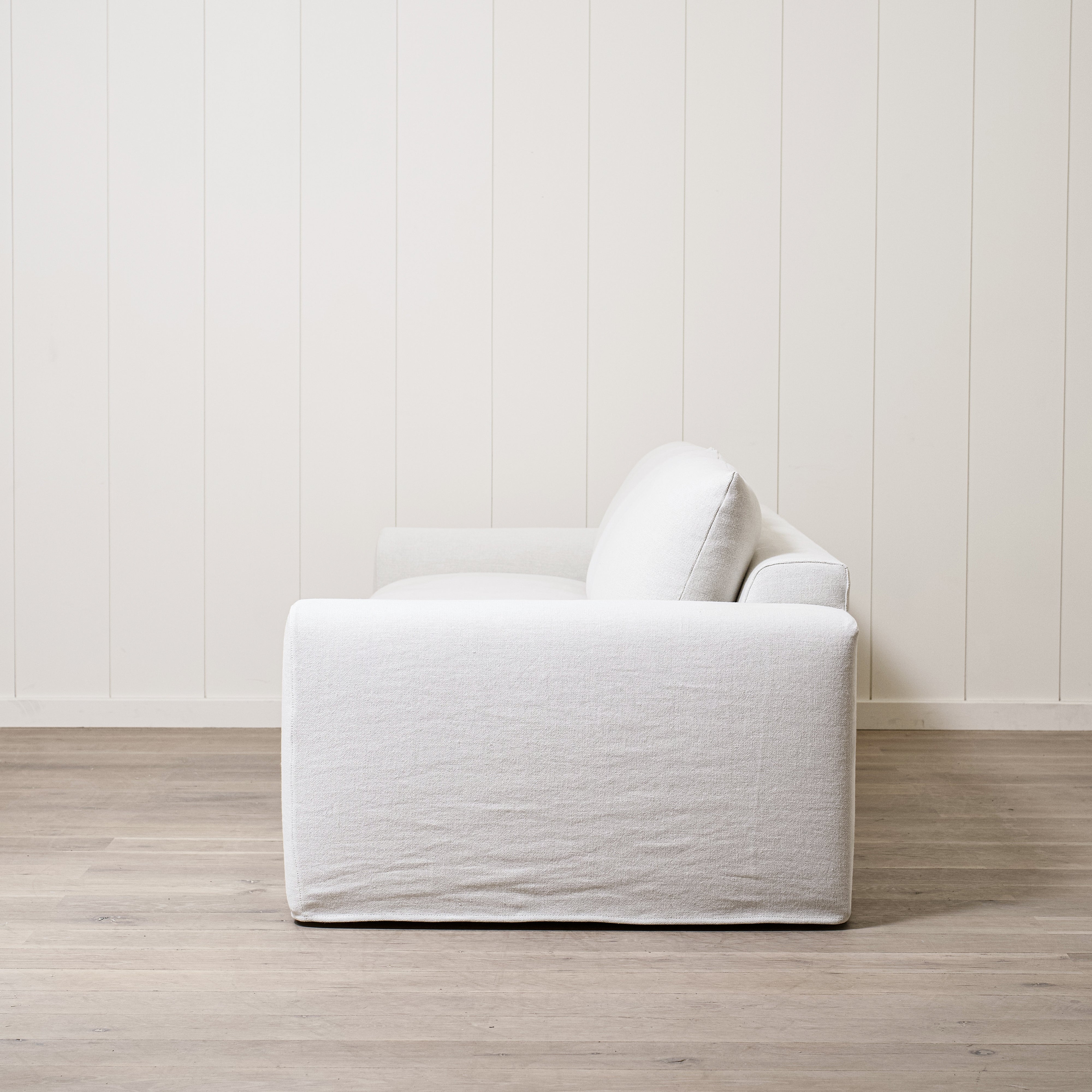 As Shown: Two Back Cushions Configuration, Slipcovered Frame Natural