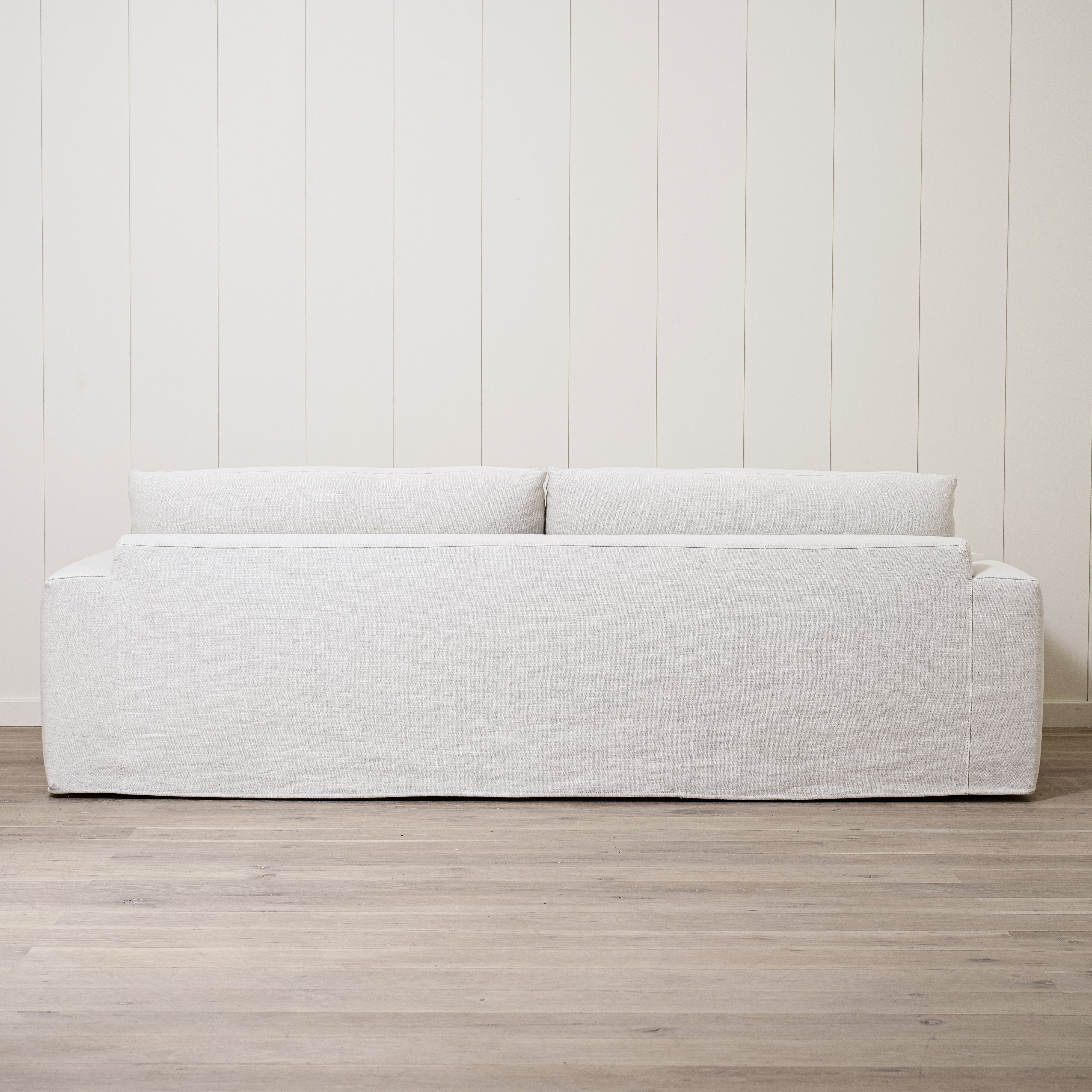 As Shown: Two Back Cushions Configuration, Slipcovered Frame Natural