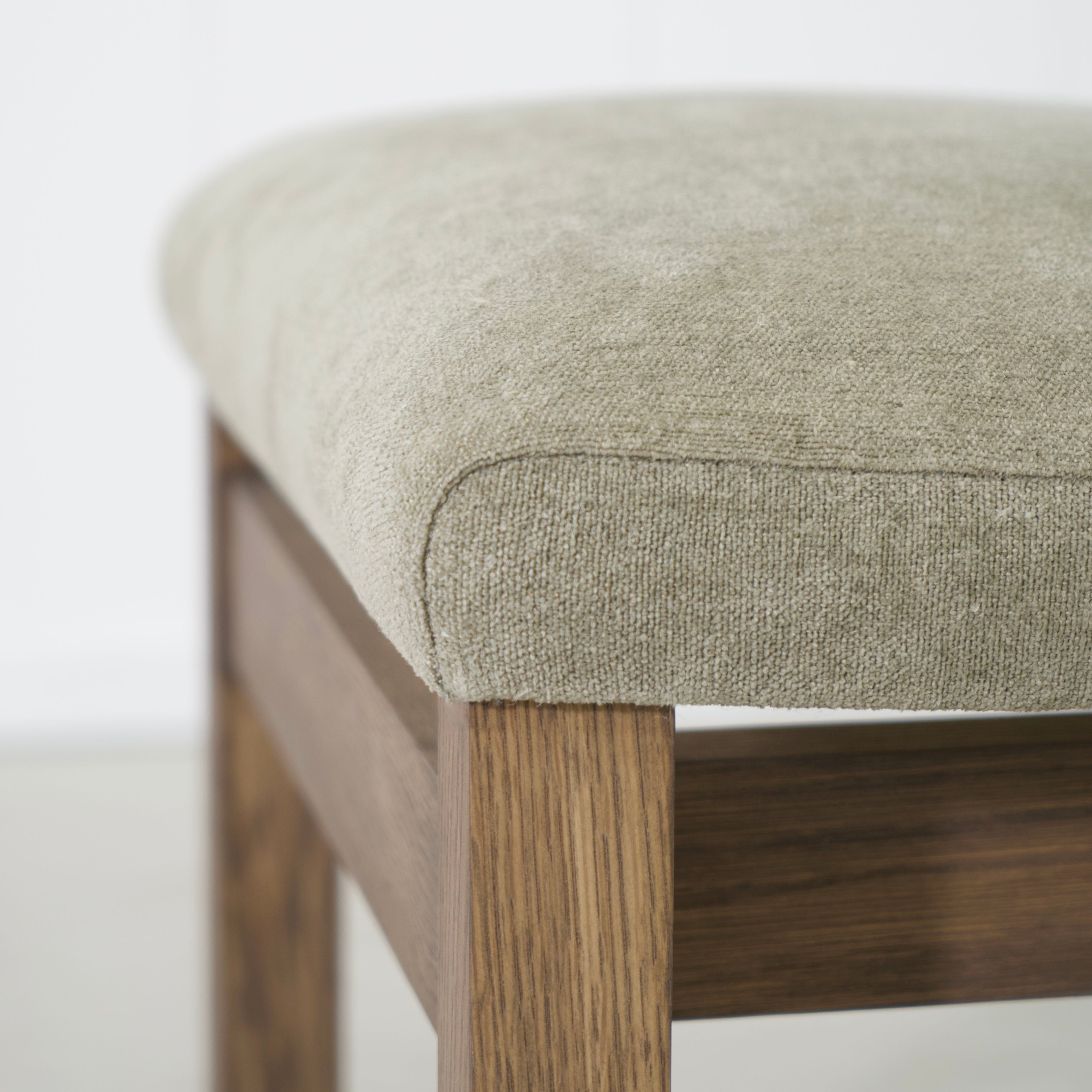 Sheepskin Olive back, Bellamy Moss seat. Cashmere Brown (Discontinued Finish) oak.