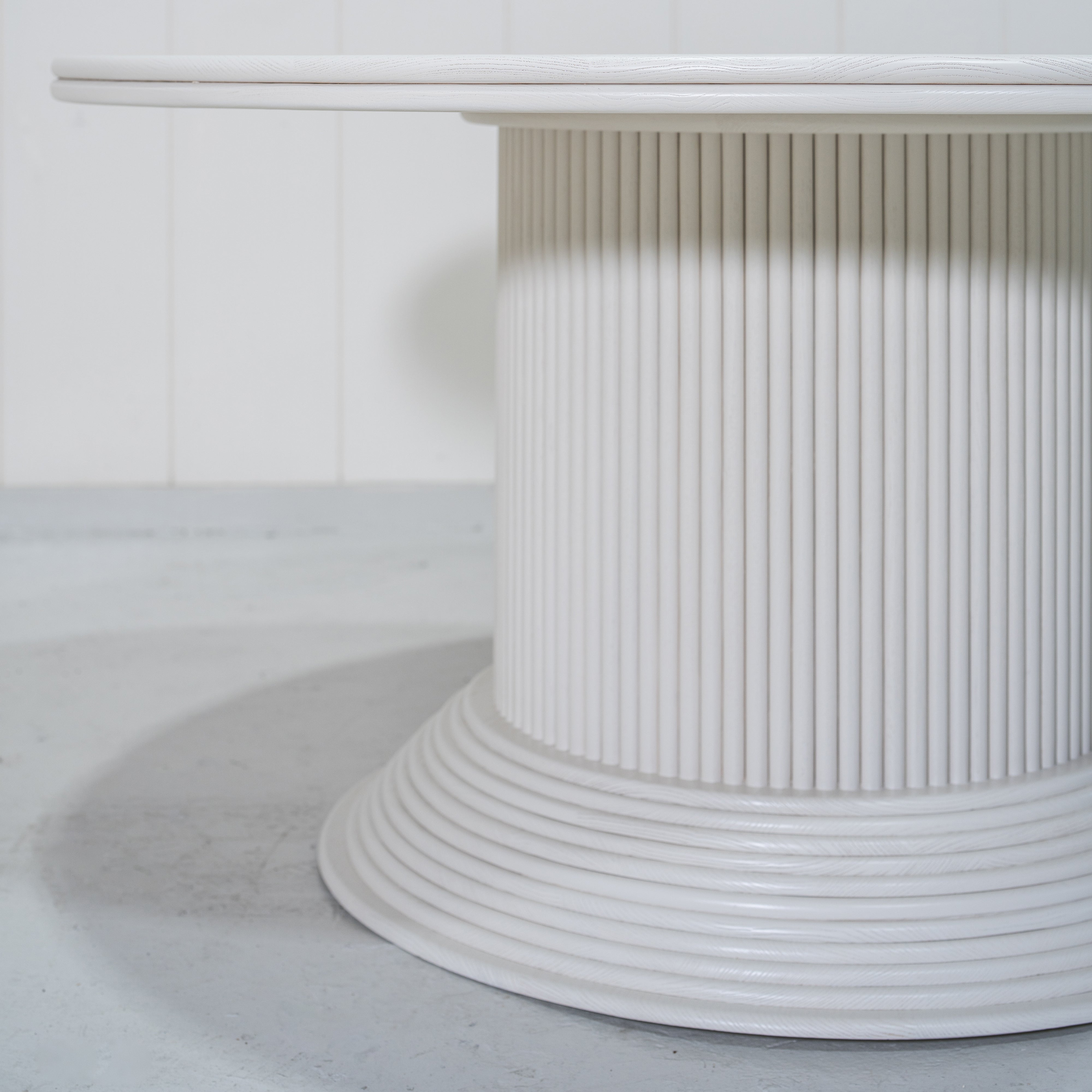 As Shown: 58"Dia x 30"H | Material: Solid Oak | Edge: Double Bullnosed | Base: Reeded | Finish: WireBrushed Painted EdgeComb Grey