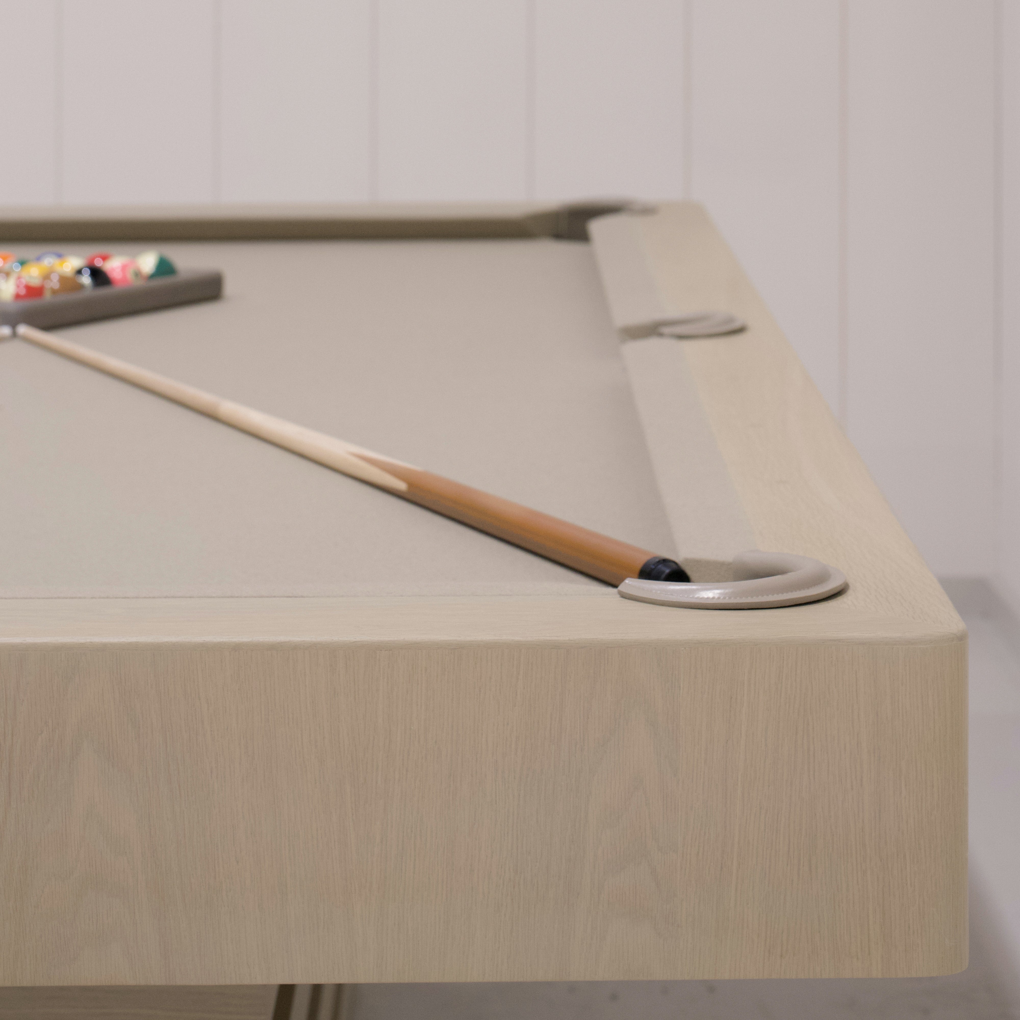 As Shown:  105”L x 62.5”D x 34”H | Material: Solid and Engineered Oak | Finish: Natural & Beige Pockets