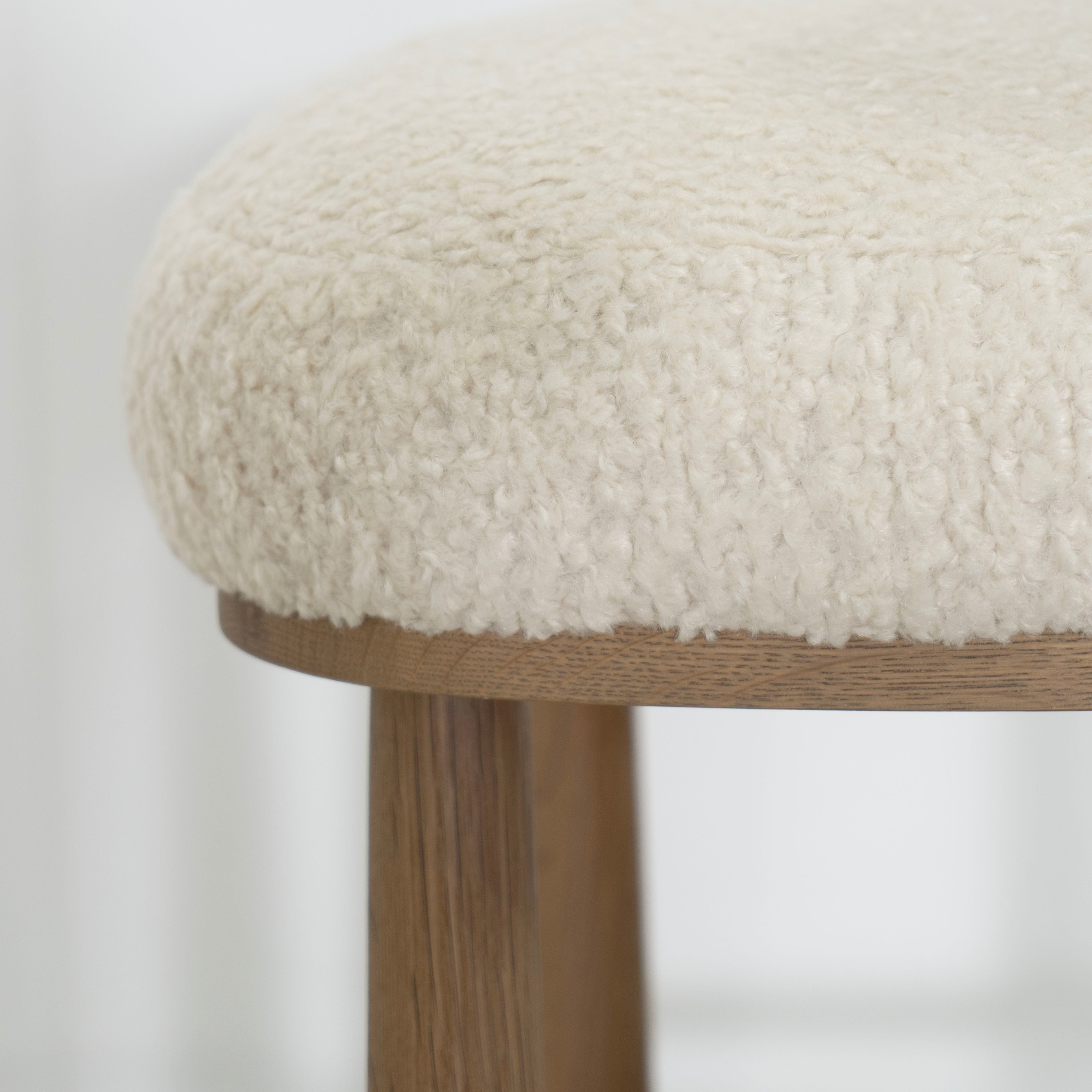 As Shown: in Sheepskin Ivory. Oak finished in Cashmere Brown (Discontinued Finish).