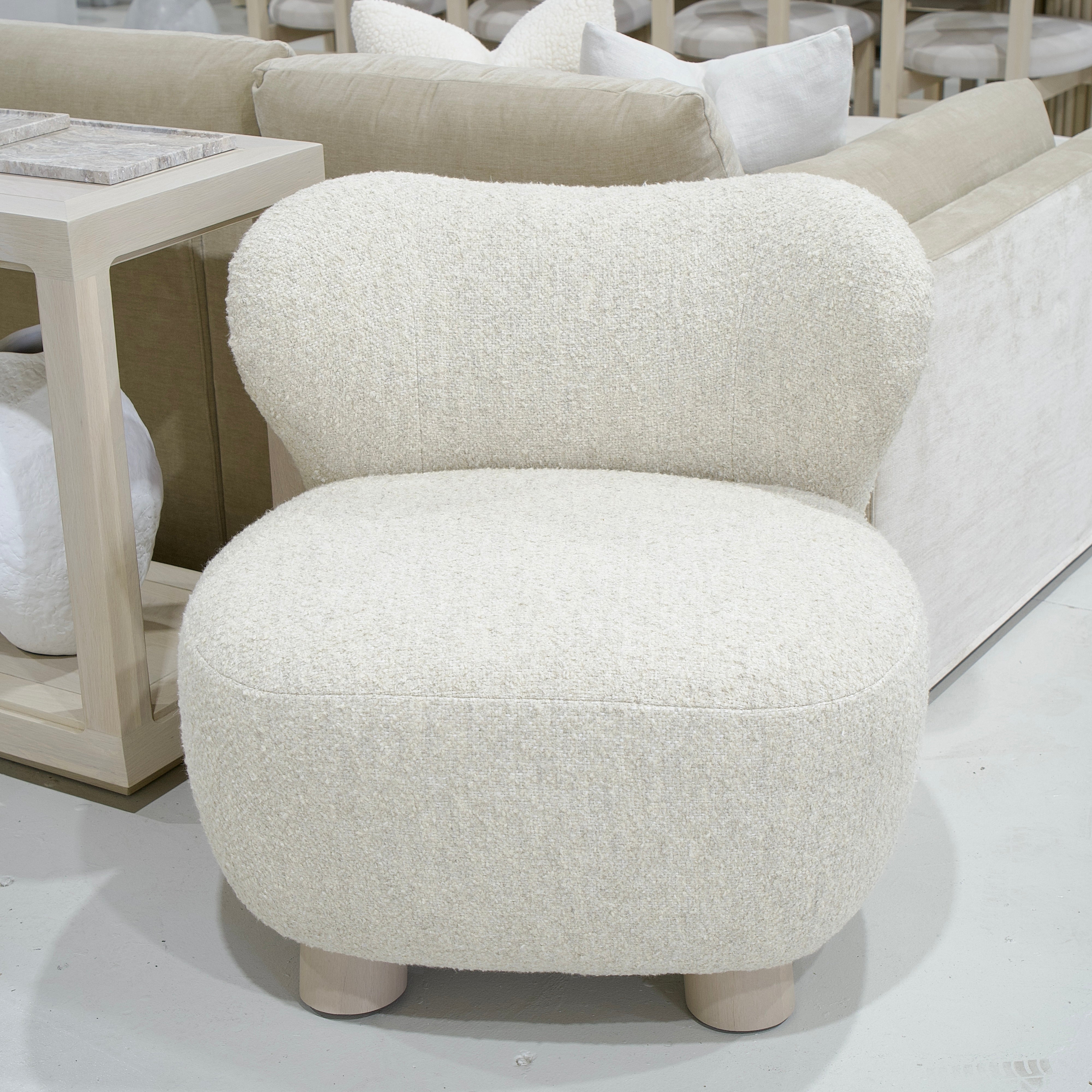 As Shown: 34"L x 35"D x 32"H | Style: Upholstered | Fabric: Berber Natural | Base: Legs | Finish: Sand