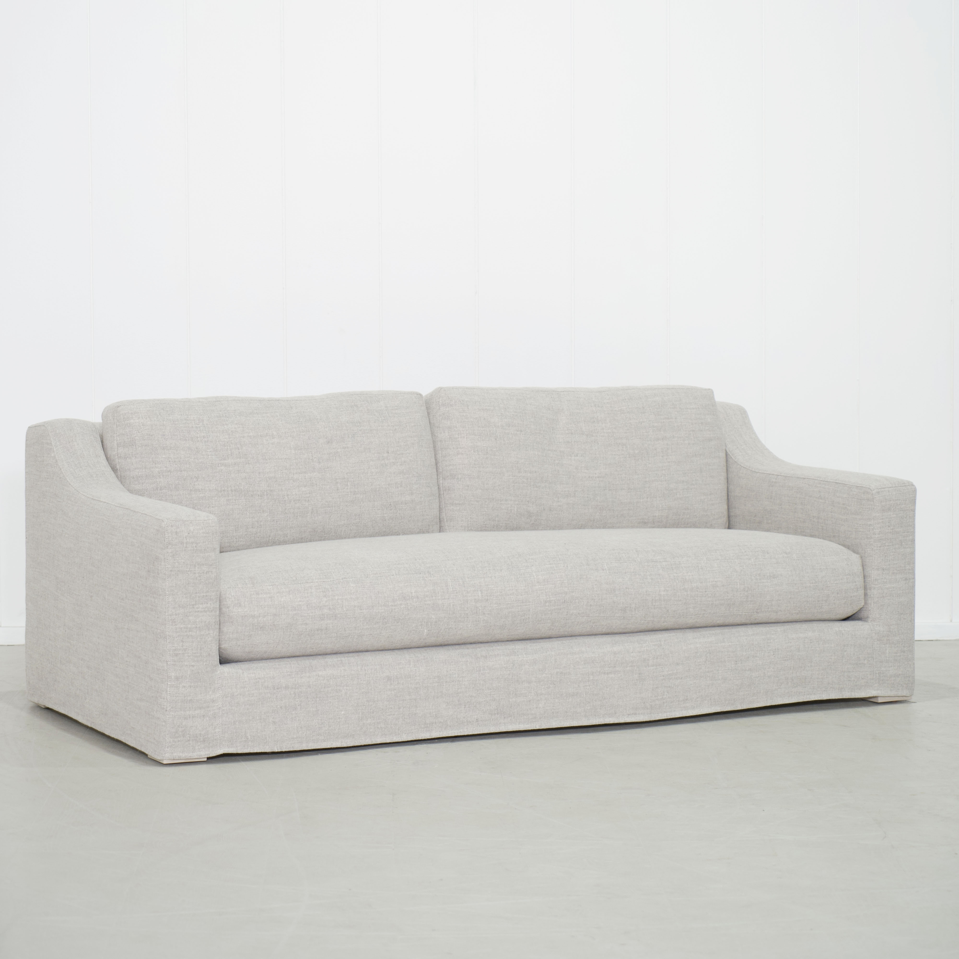 As Shown: Slipcovered in Belgian Mulberry with a 2 over 1 Cushion Configuration