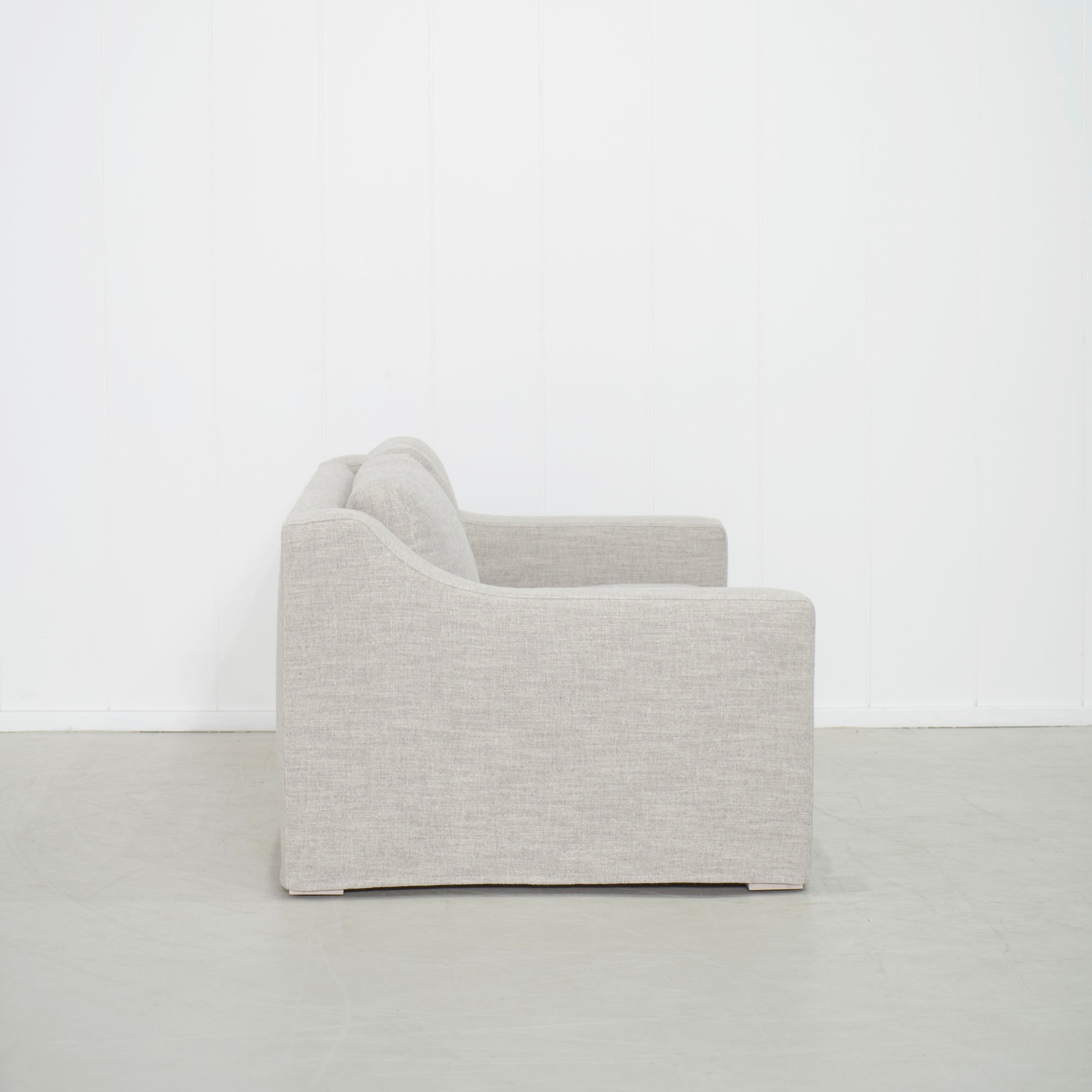 As Shown: Slipcovered in Belgian Mulberry with a 2 over 1 Cushion Configuration