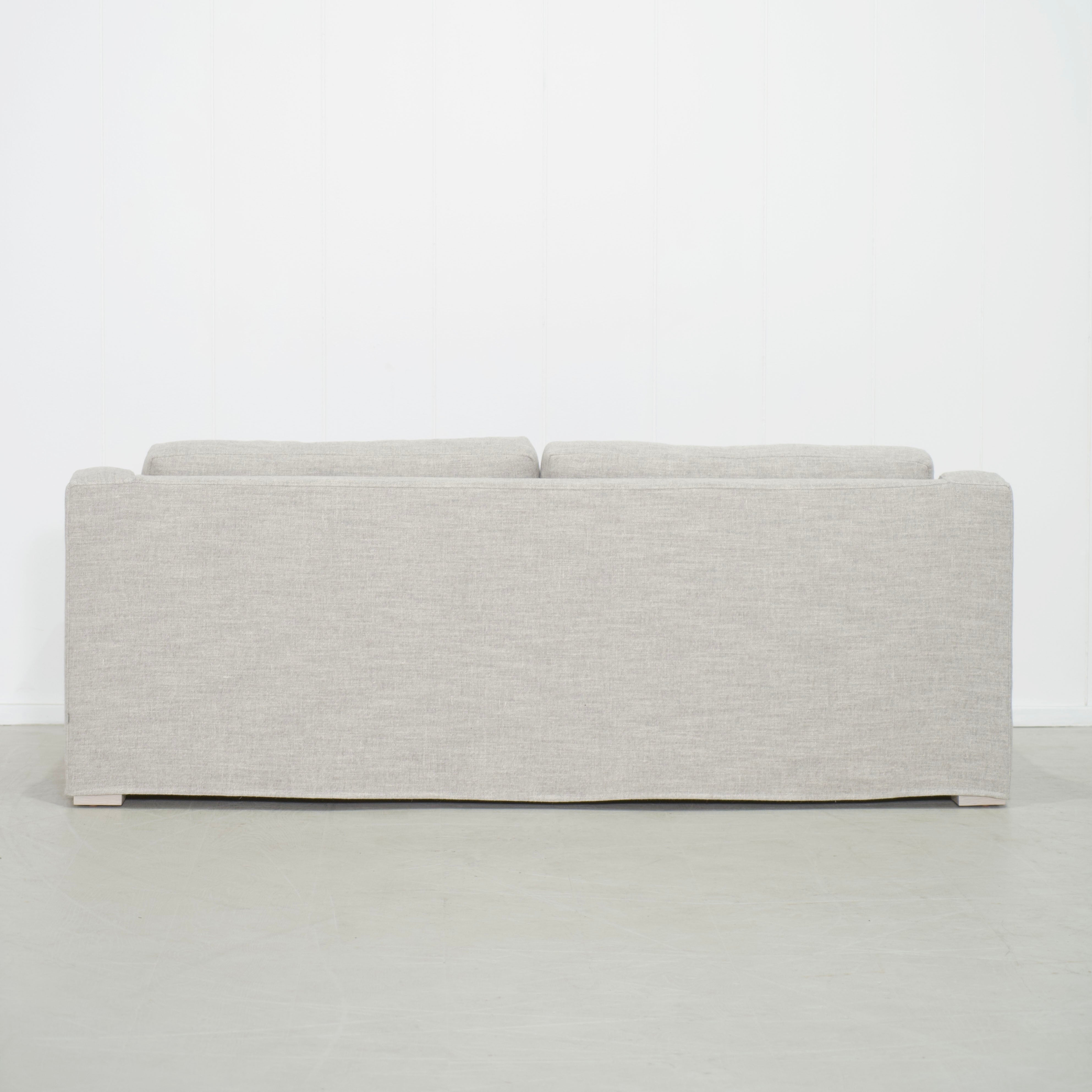 As Shown: Slipcovered in Belgian Mulberry with a 2 over 1 Cushion Configuration