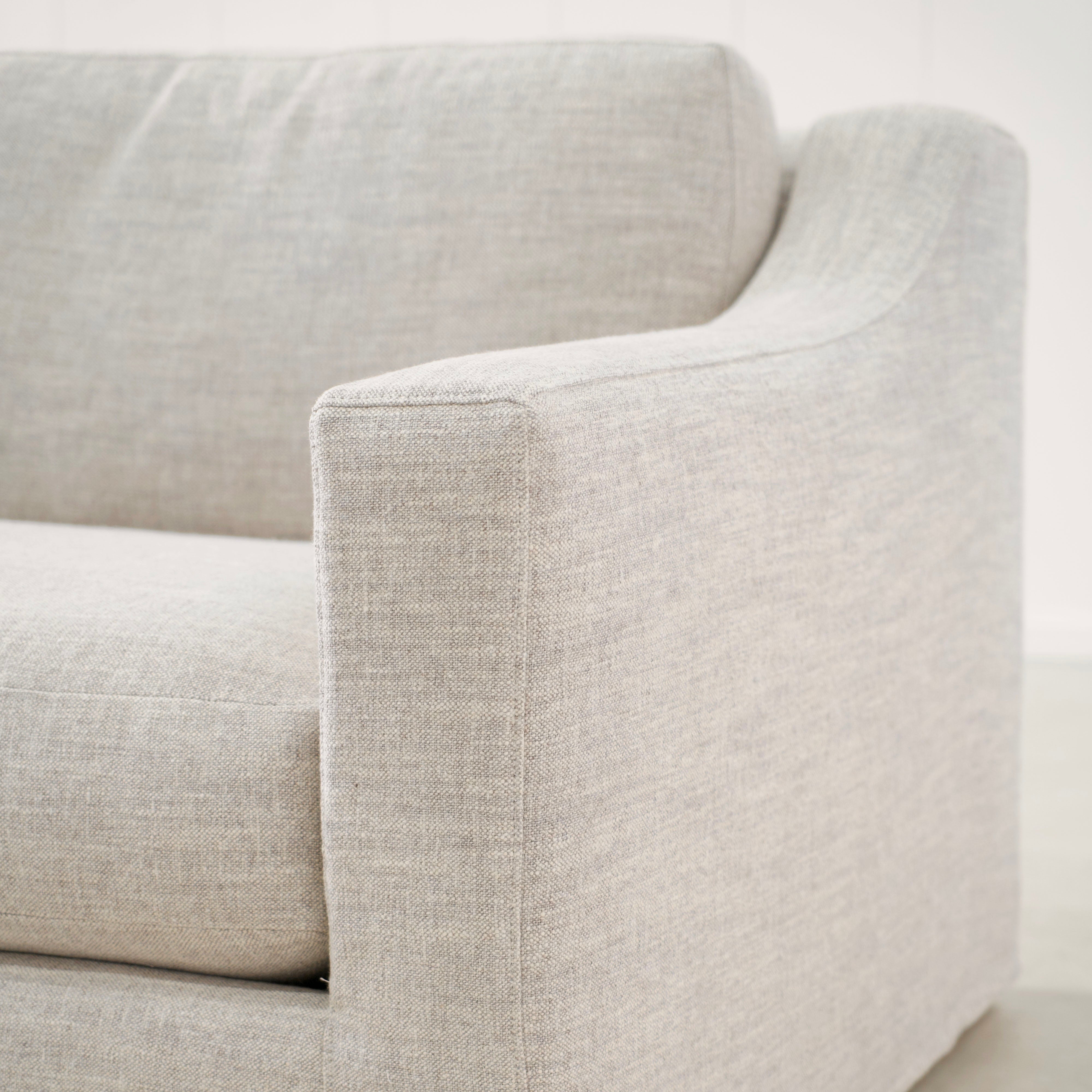 As Shown: Slipcovered in Belgian Mulberry with a 2 over 1 Cushion Configuration