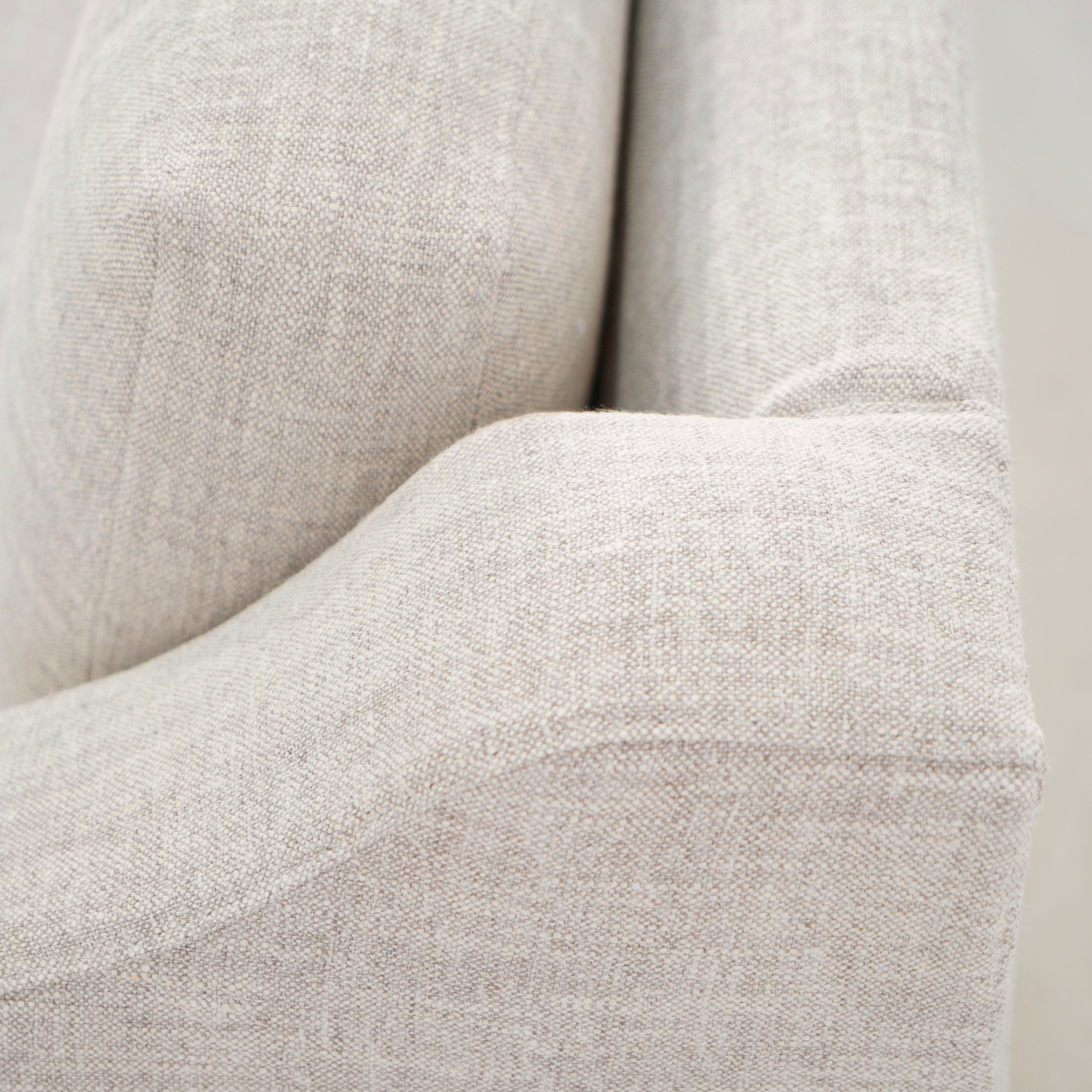 As Shown: Slipcovered in Belgian Mulberry with a 2 over 1 Cushion Configuration