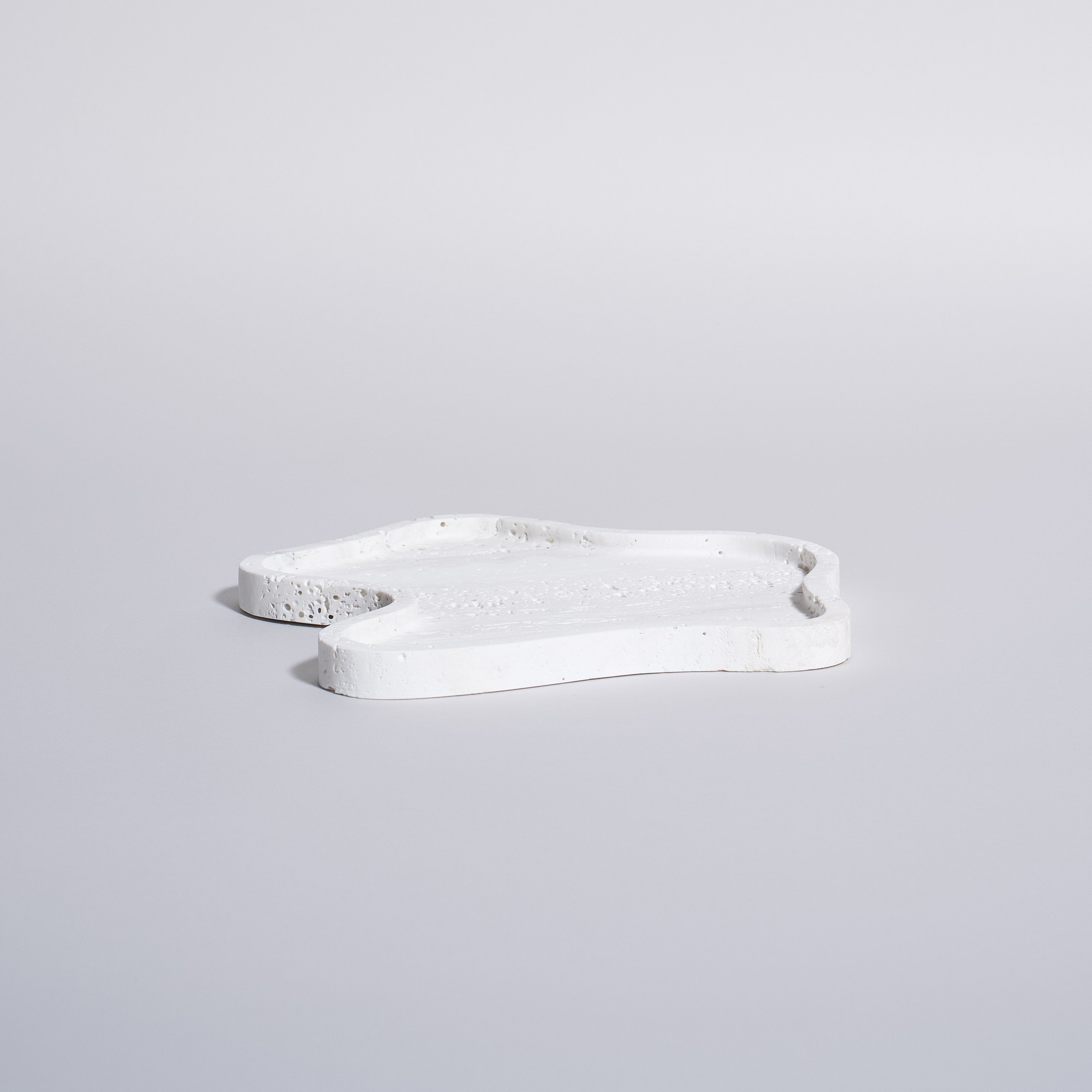 As shown in White Travertine