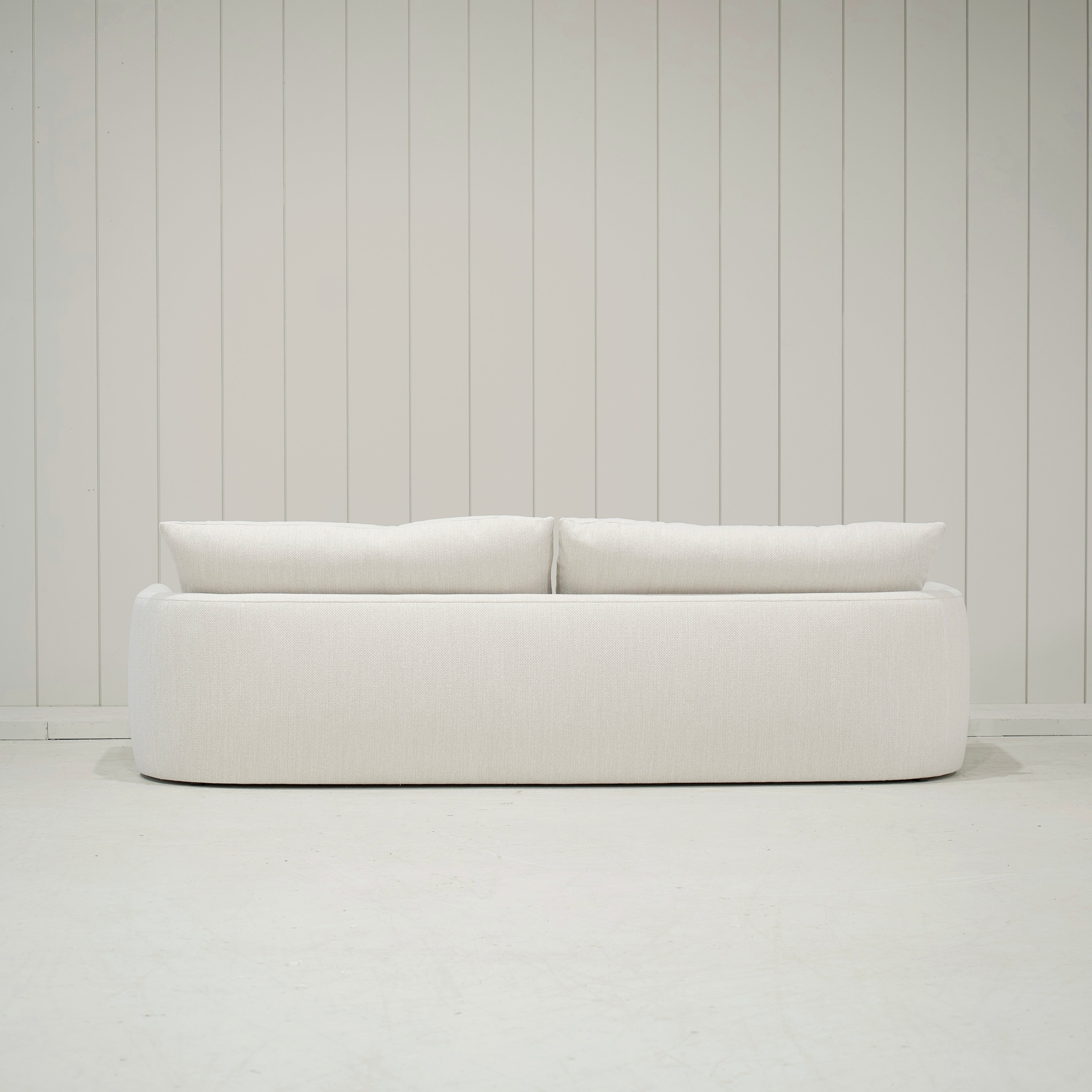 As Shown: Upholstered in Julian Crisp with a 2 over 1 Cushion Configuration