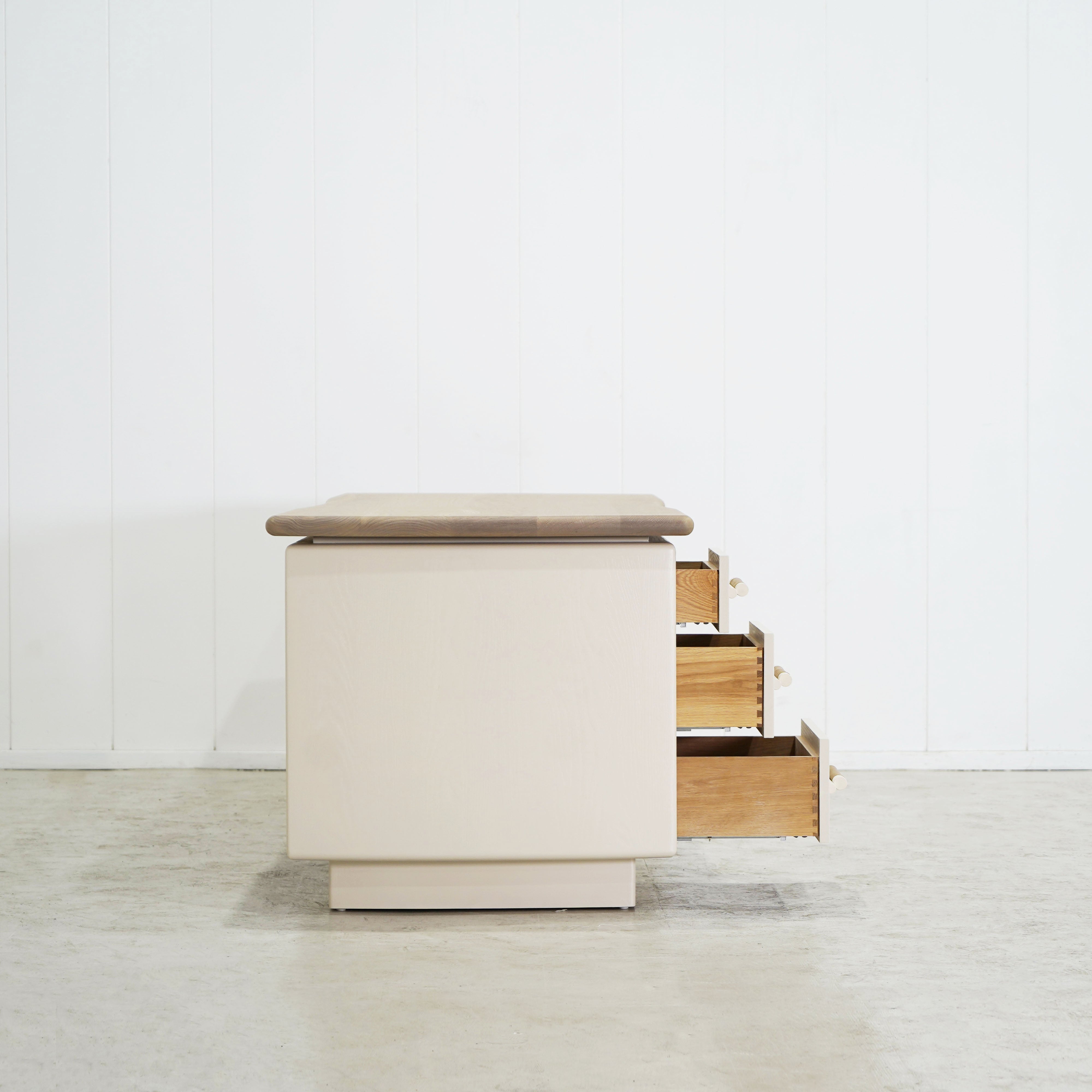 As Shown: Custom Finish (Top) in Solid Oak with a Bullnosed Edge, Wire brushed oak (Base) in Revere Pewter, with a COL leather handle