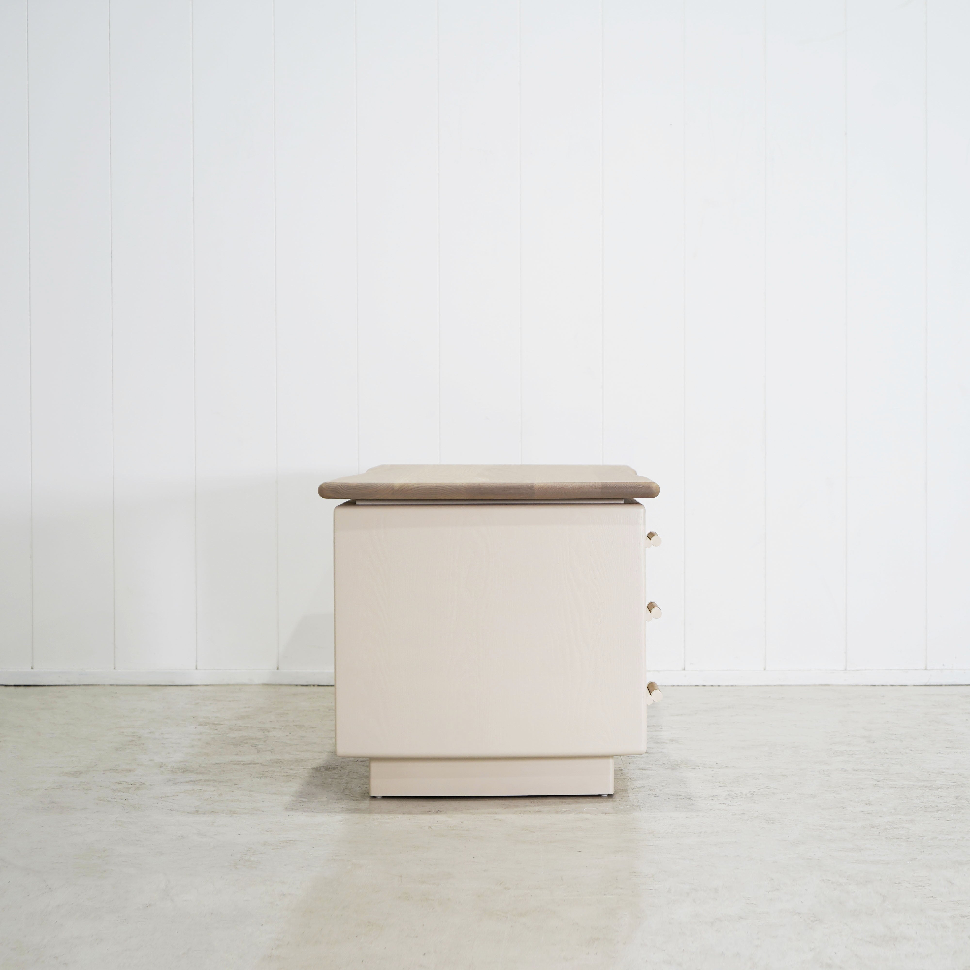 As Shown: Custom Finish (Top) in Solid Oak with a Bullnosed Edge, Wire brushed oak (Base) in Revere Pewter, with a COL leather handle