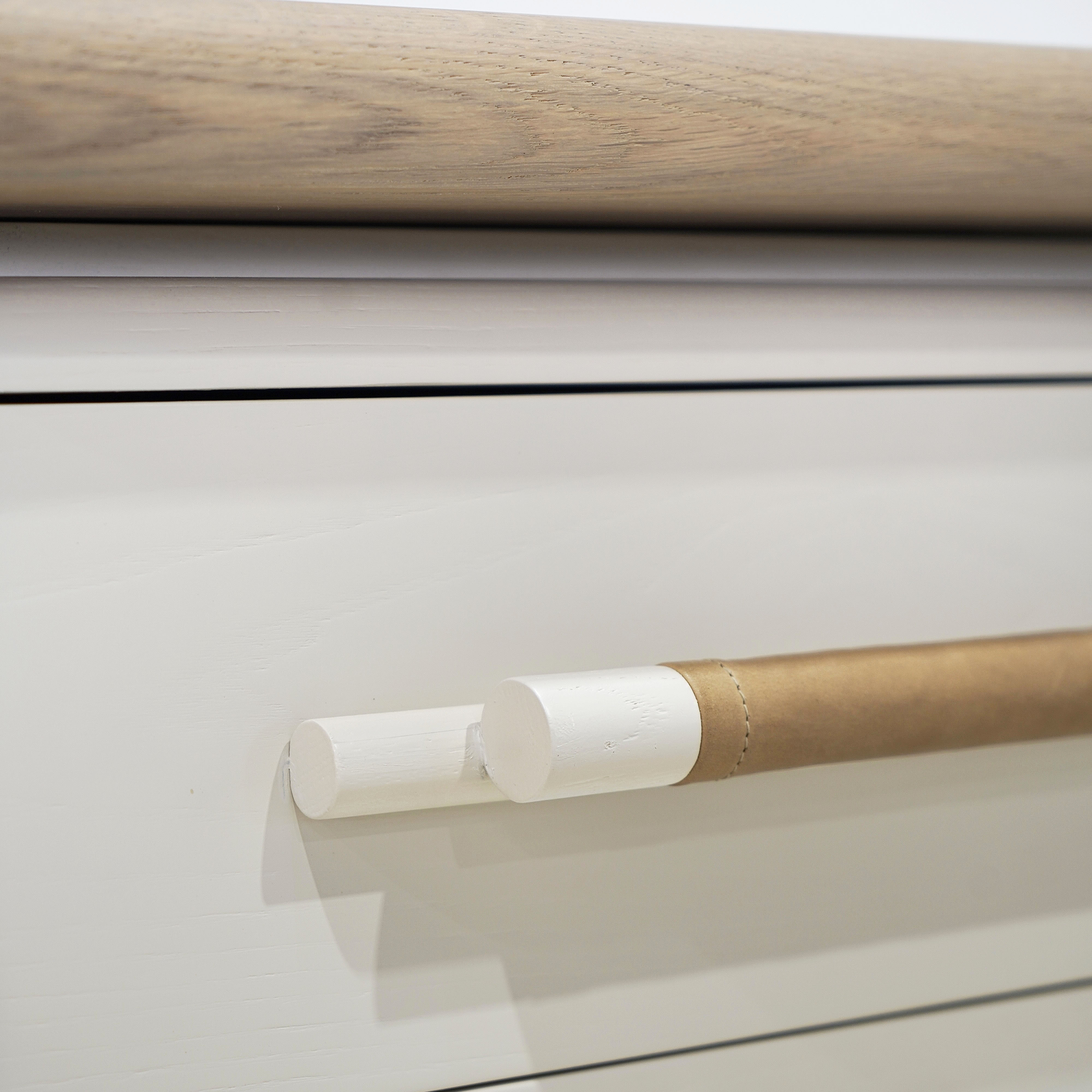 As Shown: Custom Finish (Top) in Solid Oak with a Bullnosed Edge, Wire brushed oak (Base) in Revere Pewter, with a COL leather handle