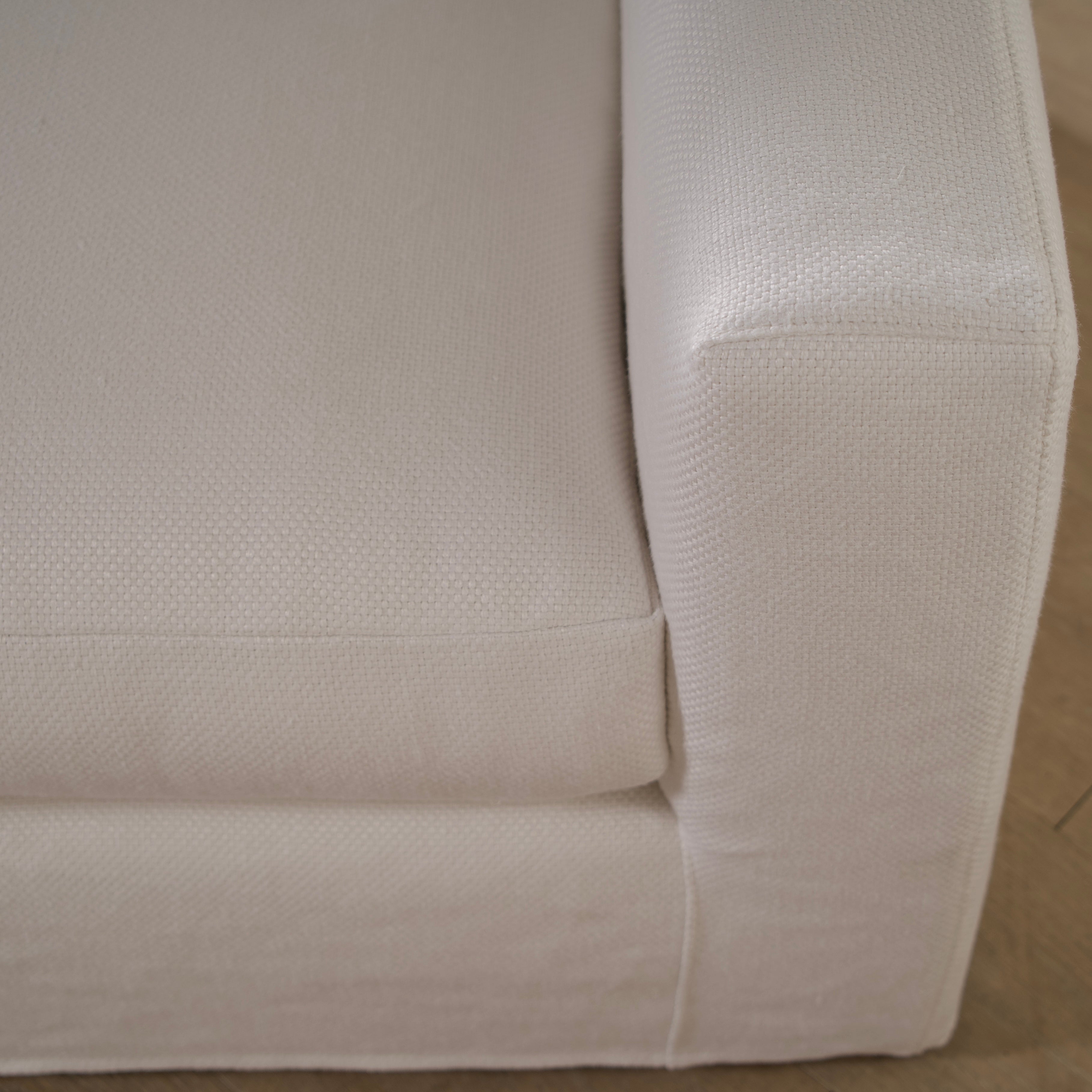 As Shown: slipcovered in COM fabric (Monte White), oak legs finished in Mint White Natural.