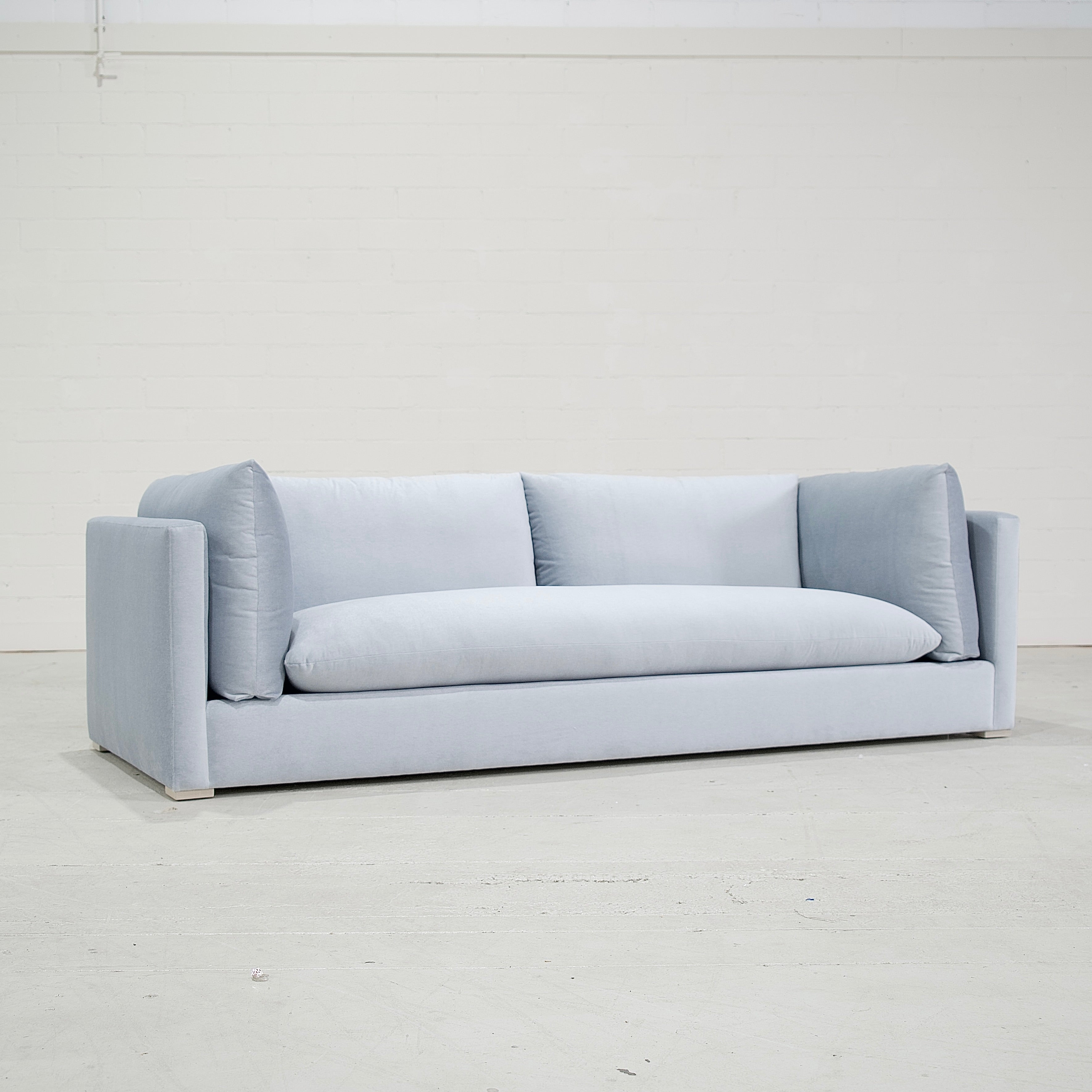 As Shown: in COM, legs finished in Mint White Super White.