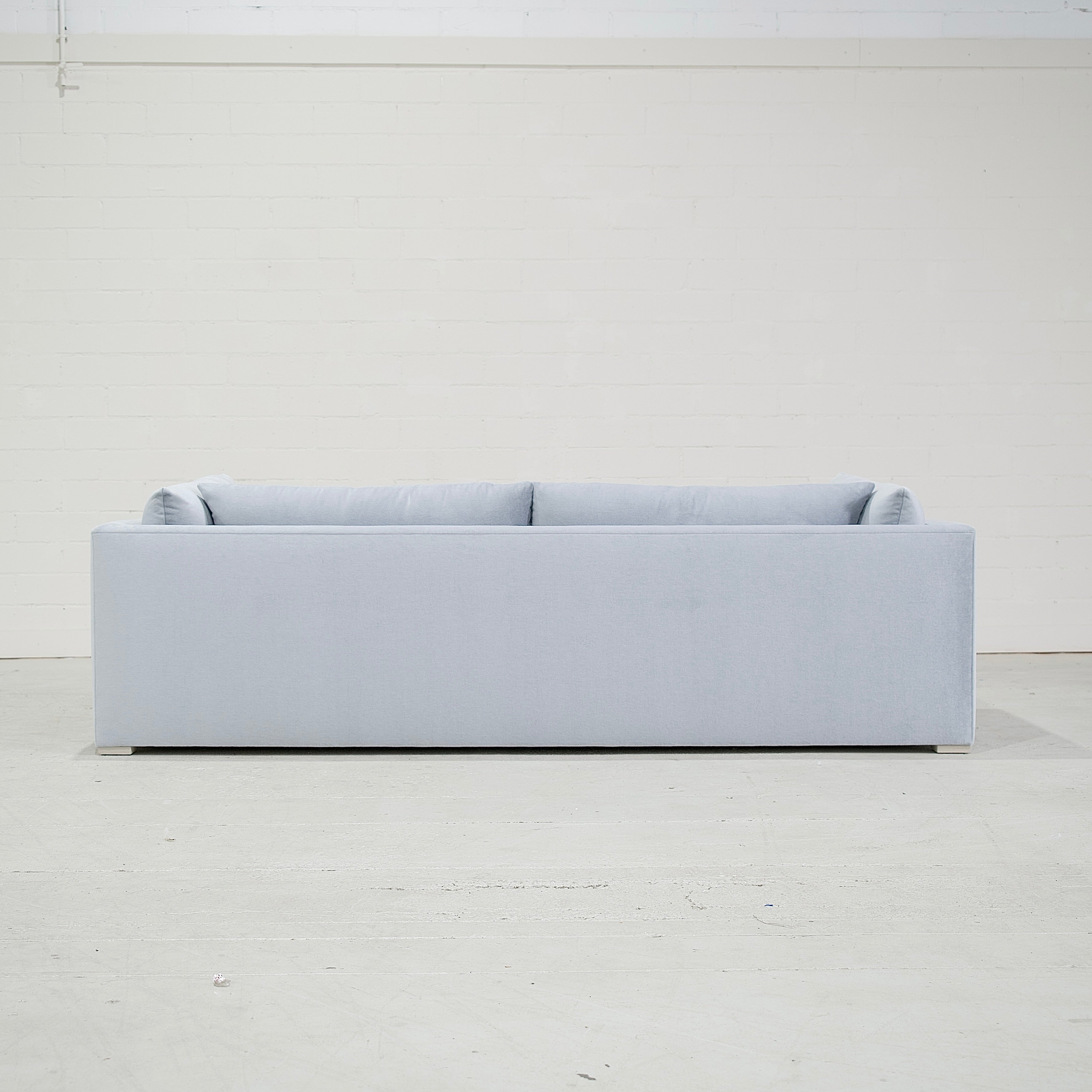 As Shown: in COM, legs finished in Mint White Super White.