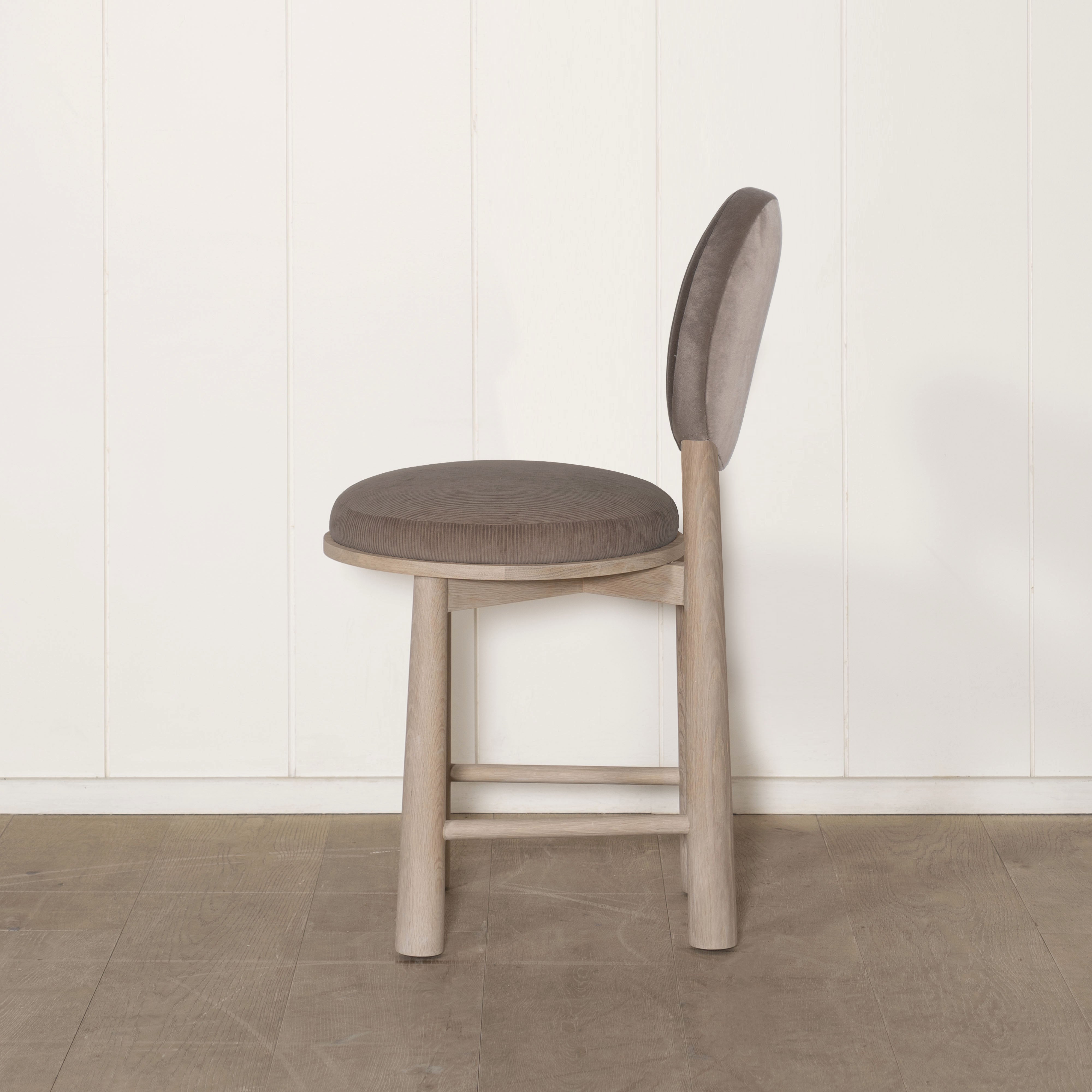 As Shown: in Sky Taupe back and Mila Driftwood seat. Oak finished in Mint White Natural.