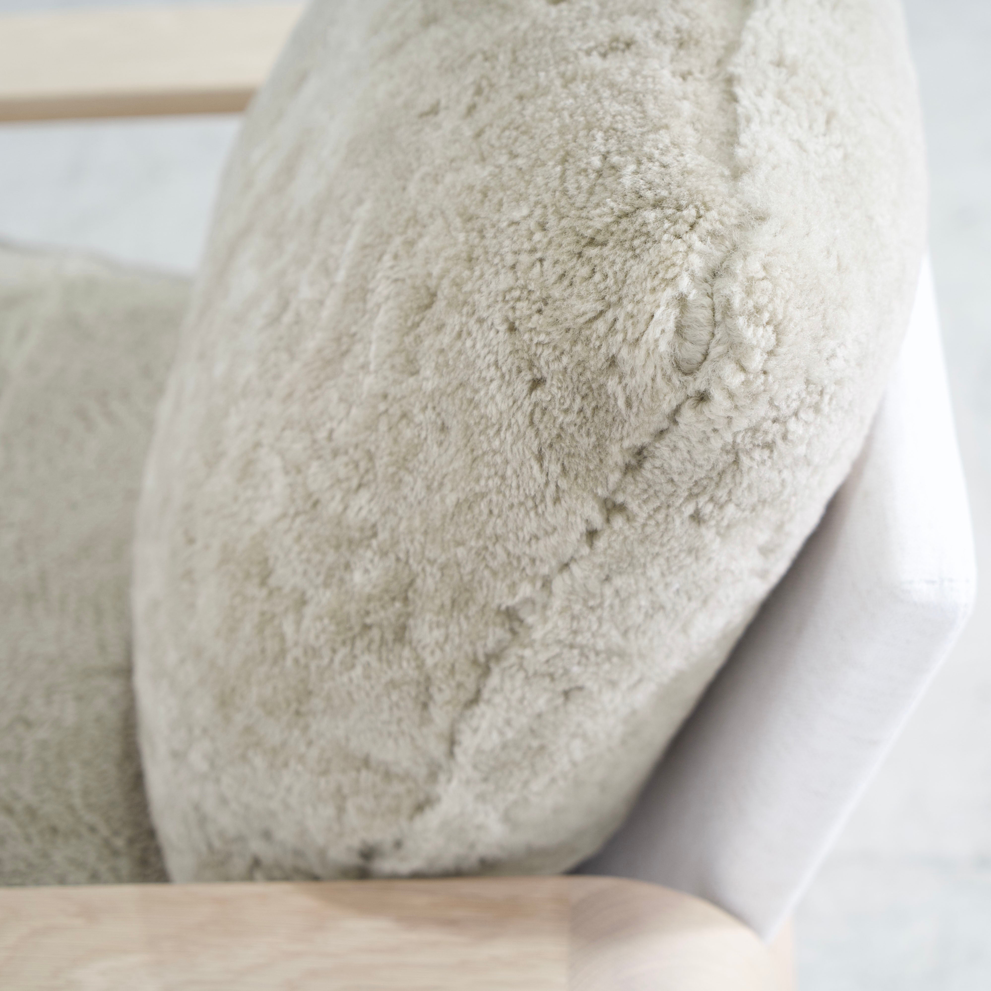 As Shown: in Dusty Beige Shearling, Nora snow frame and Mint White Natural oak.