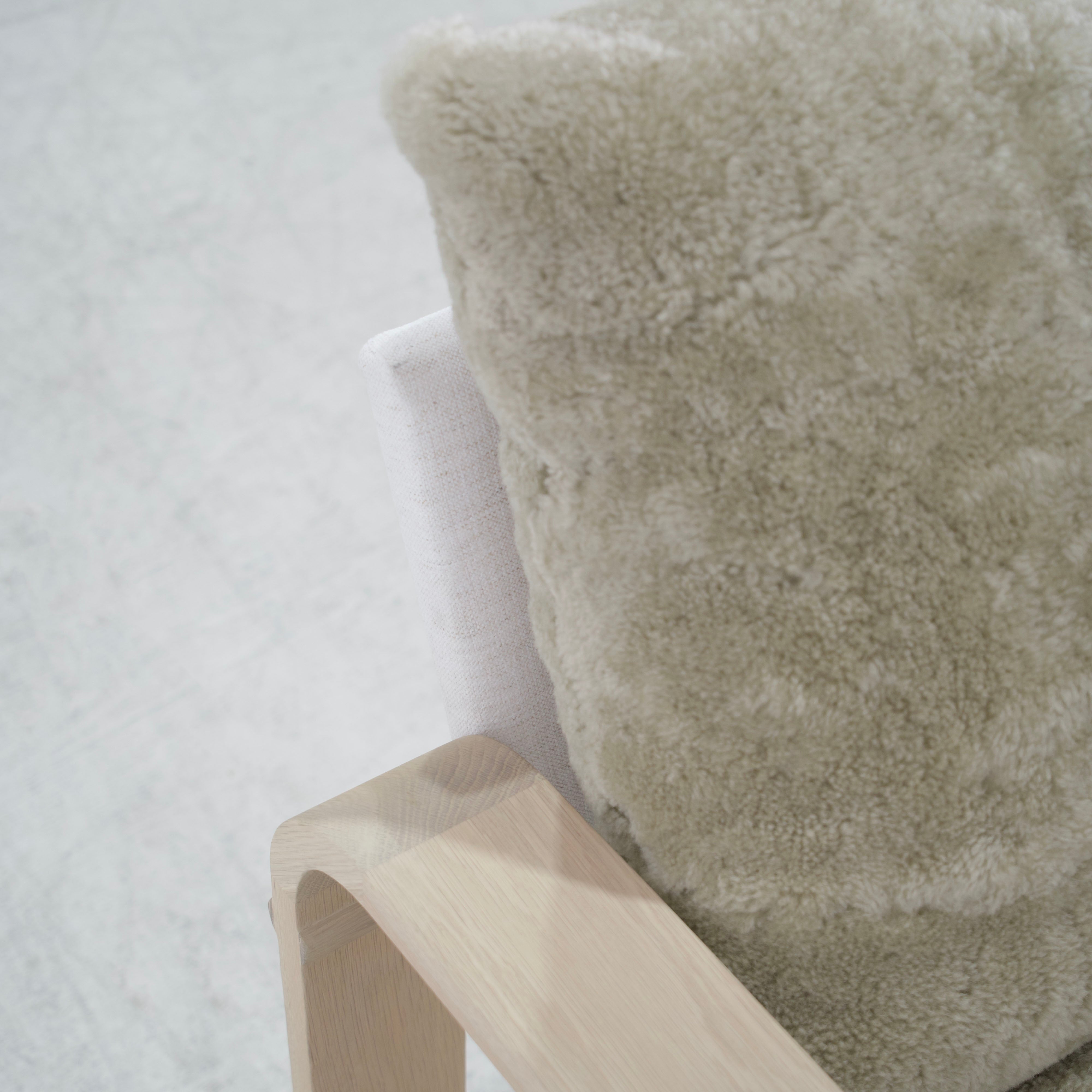 As Shown: in Dusty Beige Shearling, Nora snow frame and Mint White Natural oak.